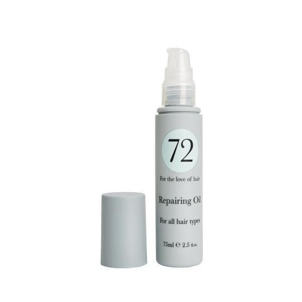 A bottle of 72 Hair Repairing Oil with a sleek design, showcasing its lightweight formula for all hair types.