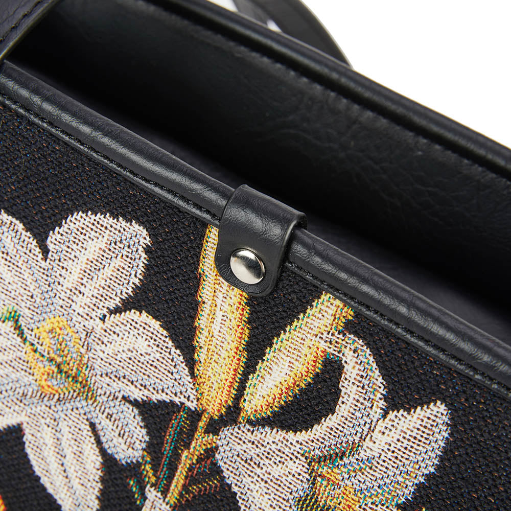 A stylish college bag featuring a floral design inspired by Ambrosius Bosschaert's painting, made from eco-friendly tapestry fabric.