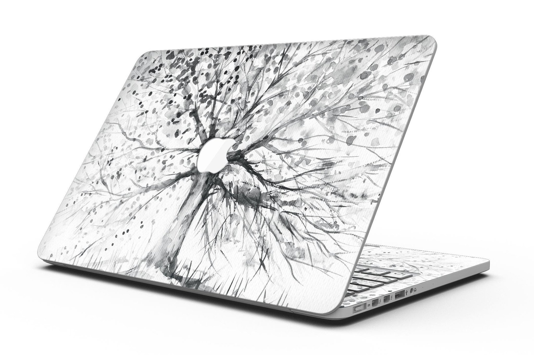 Abstract Black and White WaterColor Vivid Tree skin for MacBook Pro, showcasing a vibrant artistic design on a sleek laptop surface.