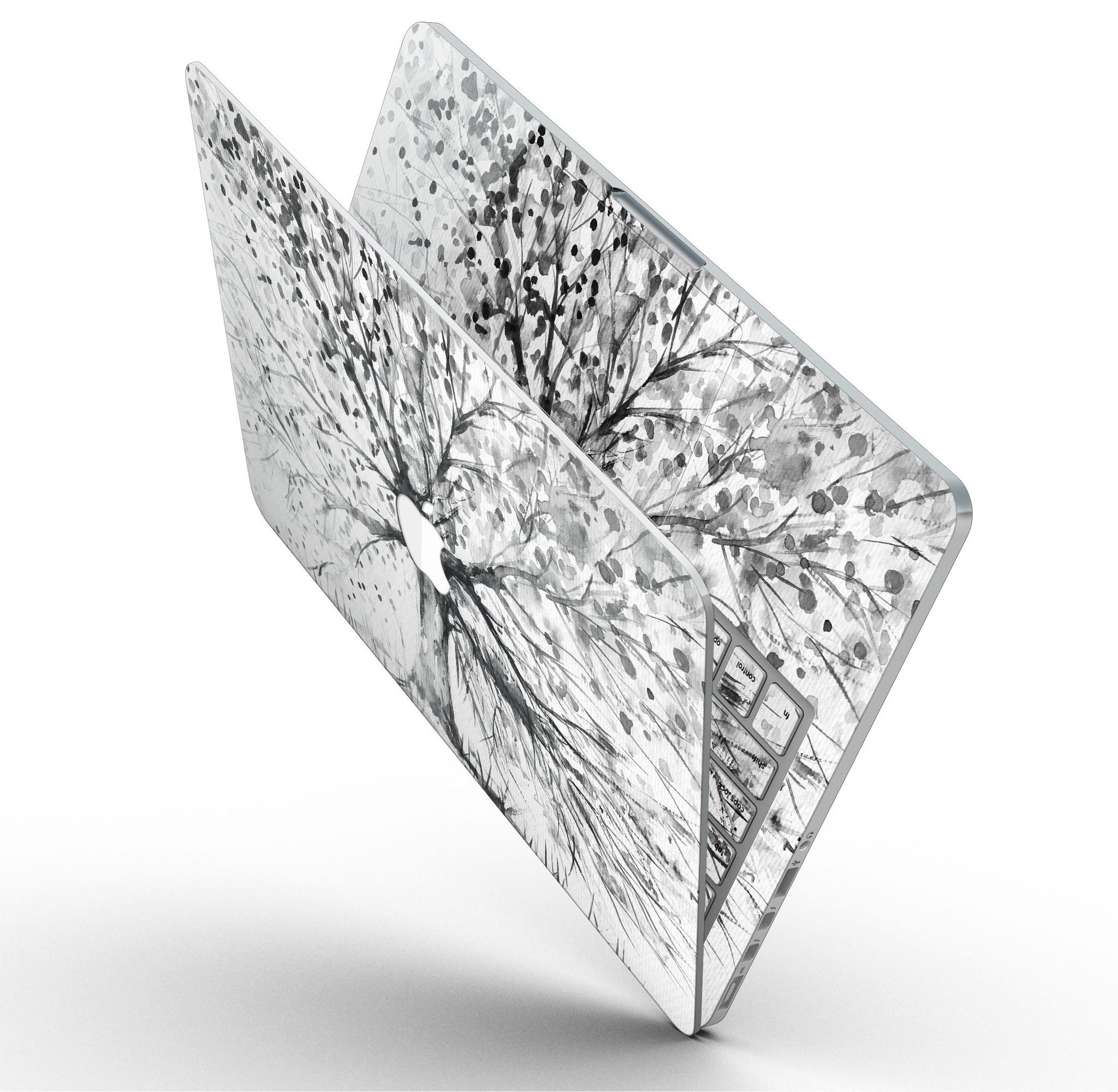 Abstract Black and White WaterColor Vivid Tree skin for MacBook Pro, showcasing a vibrant artistic design on a sleek laptop surface.