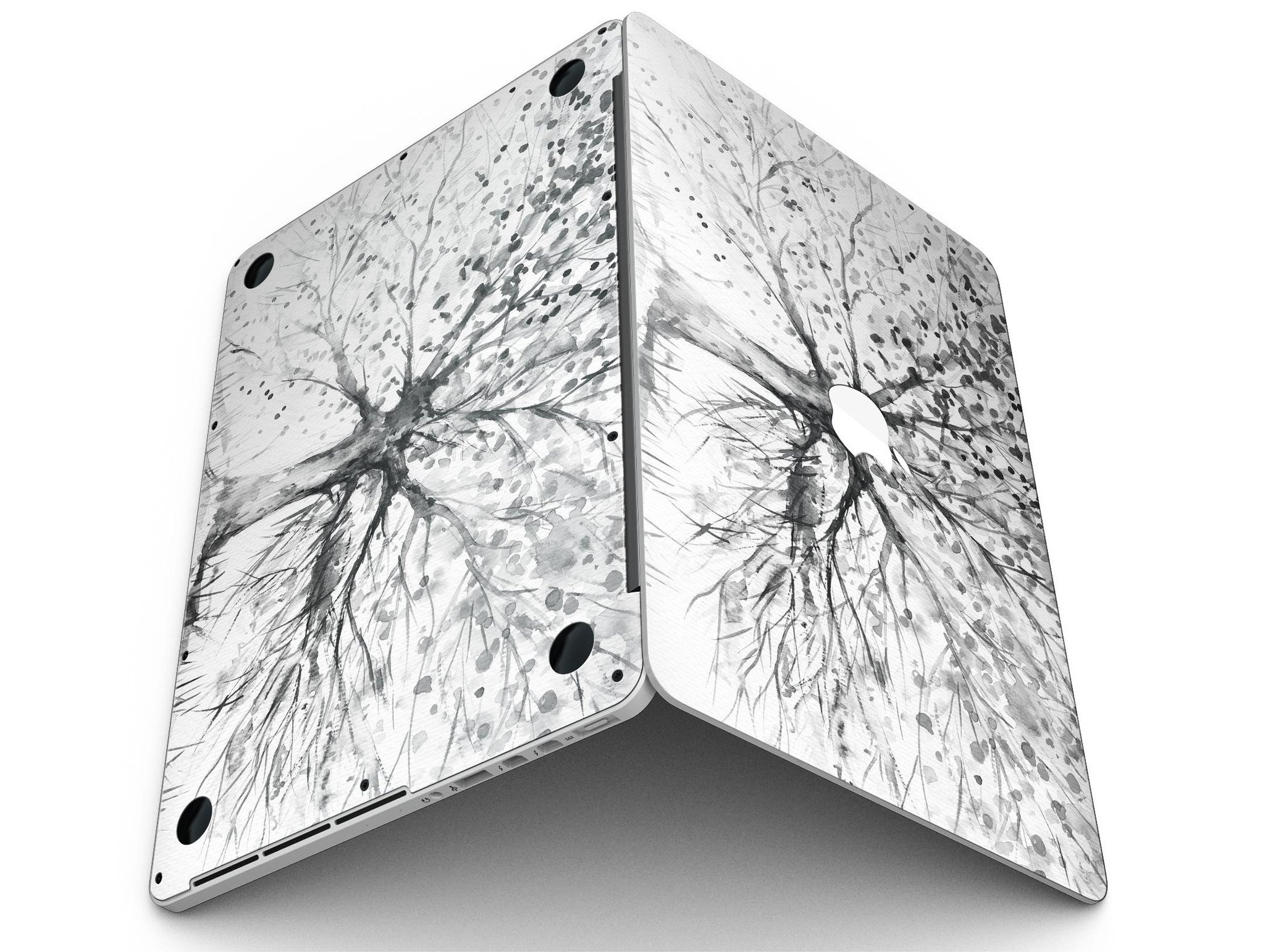 Abstract Black and White WaterColor Vivid Tree skin for MacBook Pro, showcasing a vibrant artistic design on a sleek laptop surface.