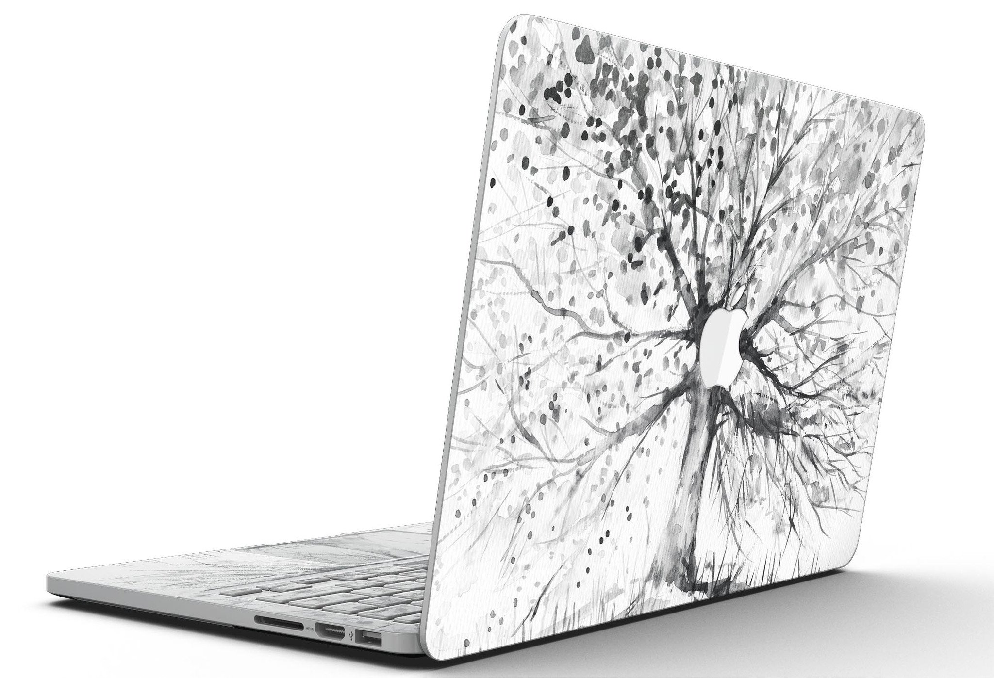 Abstract Black and White WaterColor Vivid Tree skin for MacBook Pro, showcasing a vibrant artistic design on a sleek laptop surface.