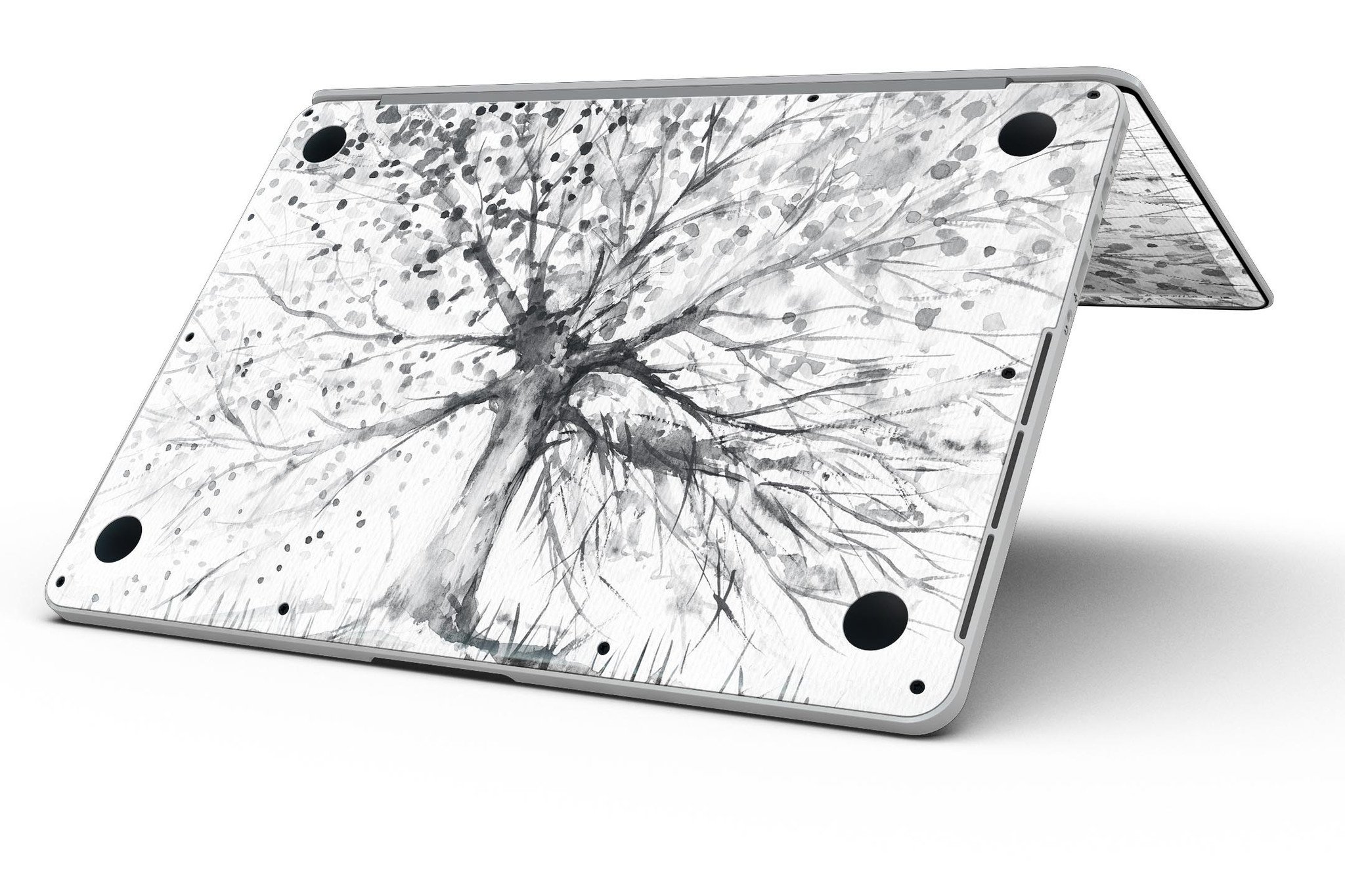 Abstract Black and White WaterColor Vivid Tree skin for MacBook Pro, showcasing a vibrant artistic design on a sleek laptop surface.