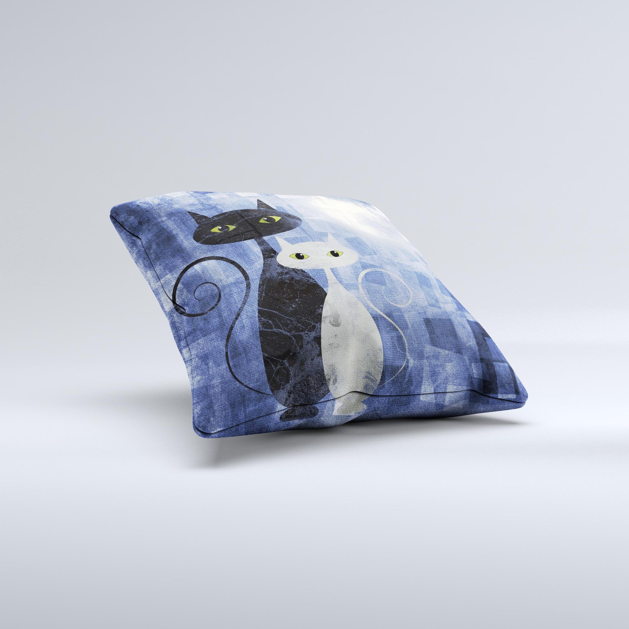 Abstract decorative throw pillow featuring black and white cat designs, handcrafted in Virginia with high-quality fabric.