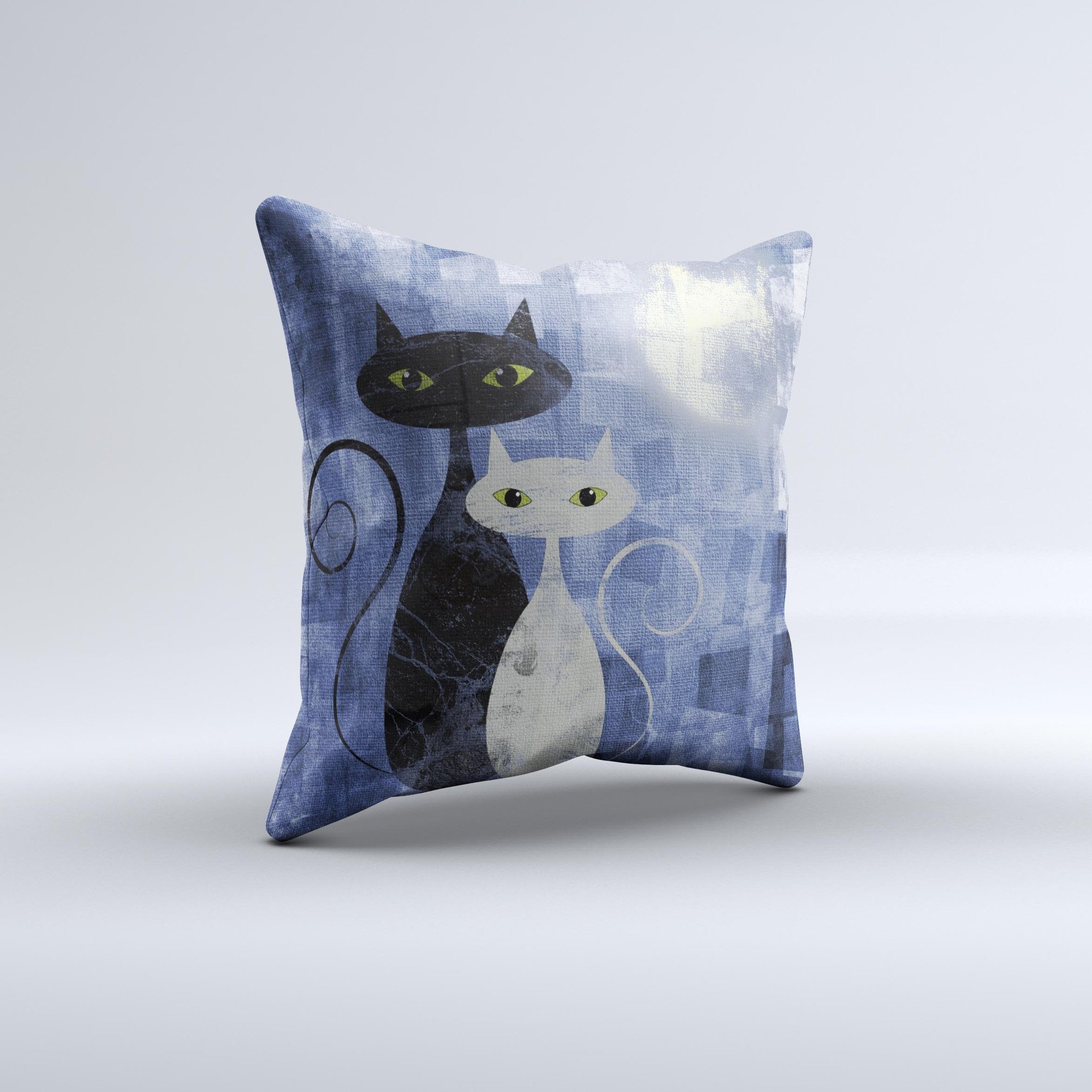 Abstract decorative throw pillow featuring black and white cat designs, handcrafted in Virginia with high-quality fabric.