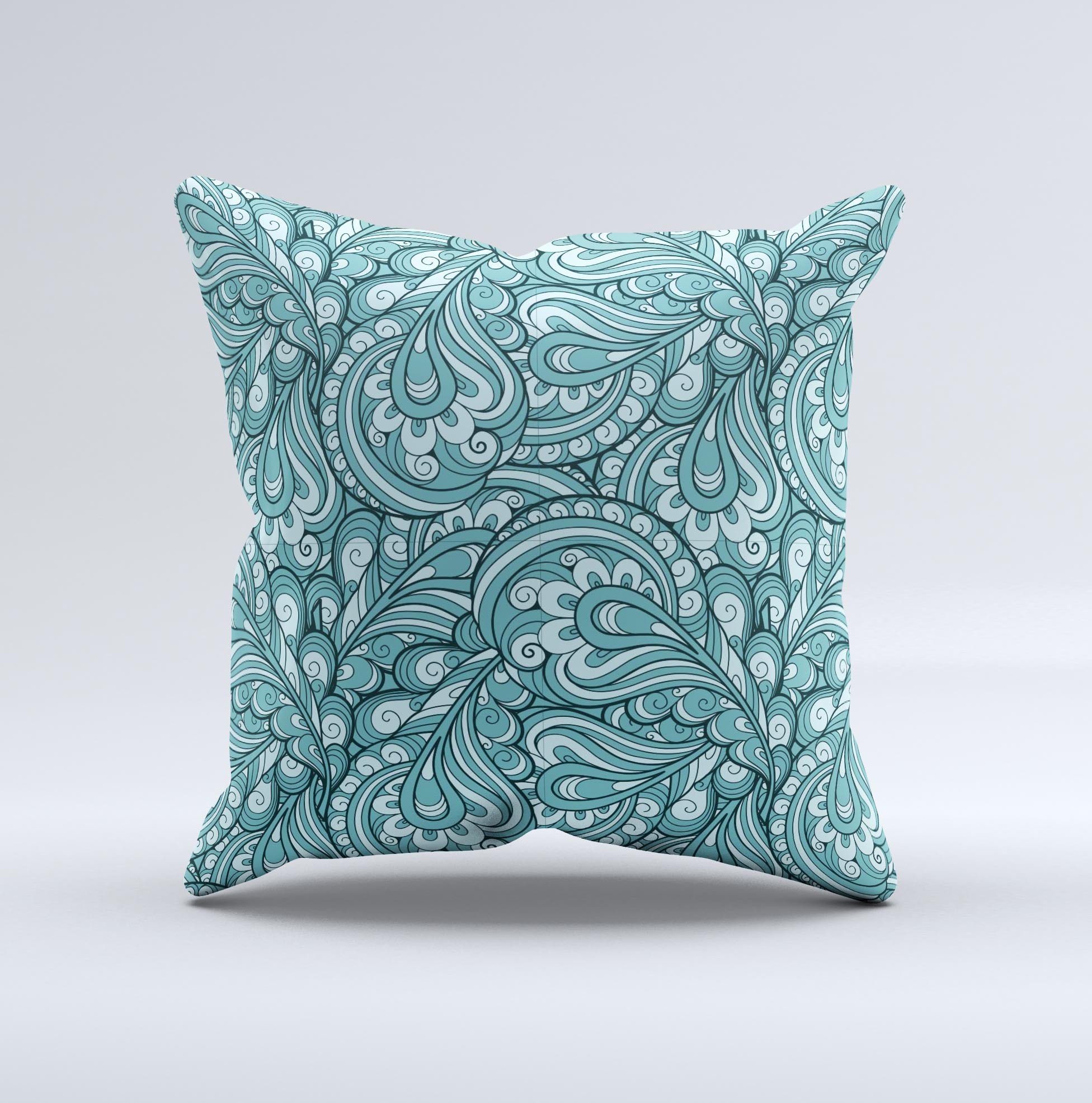 Abstract Blue Feather Paisley decorative throw pillow with intricate patterns and vibrant colors, showcasing its handmade quality.