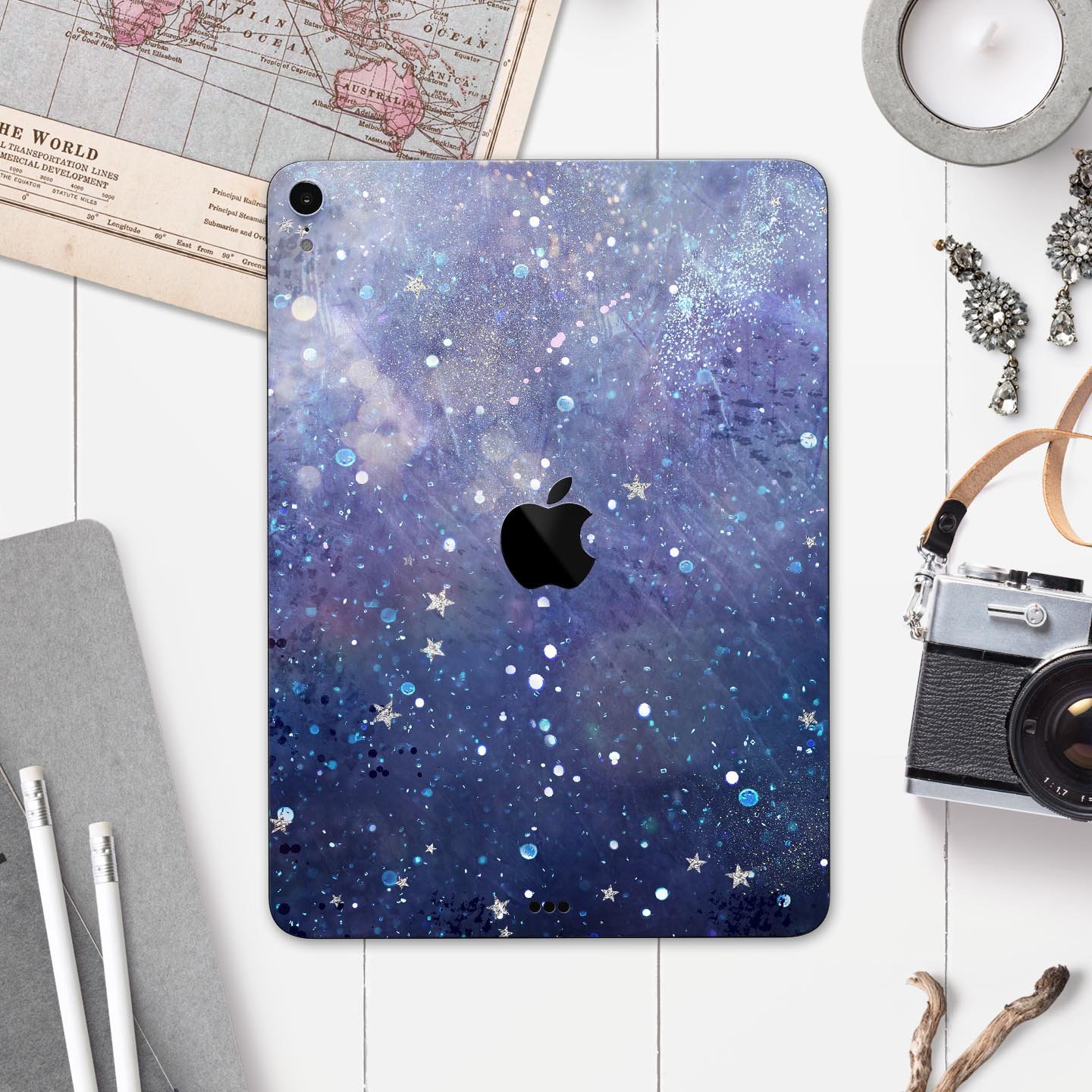 Abstract Blue Grungy Stars skin decal for Apple iPad, showcasing a vibrant star design on a protective layer.