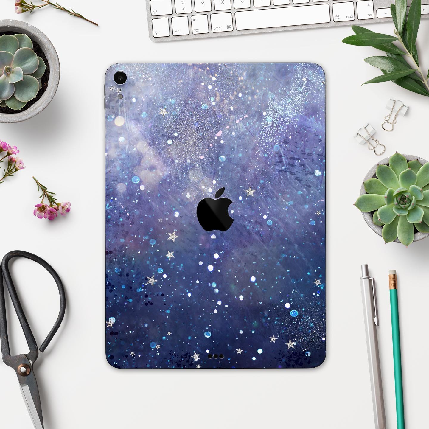 Abstract Blue Grungy Stars skin decal for Apple iPad, showcasing a vibrant star design on a protective layer.