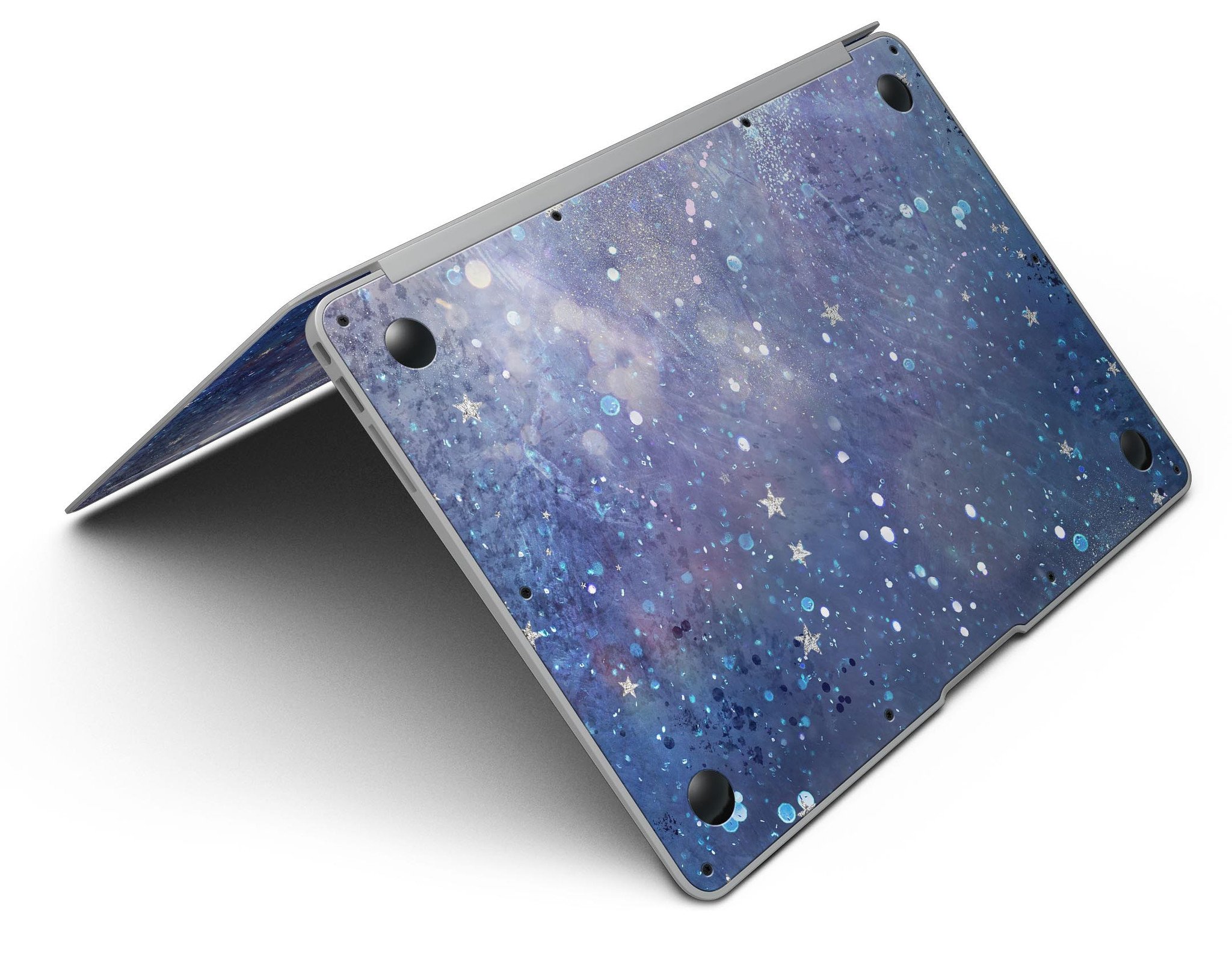 Abstract Blue Grungy Stars MacBook Air Skin Kit showcasing a vibrant design on a sleek laptop surface.