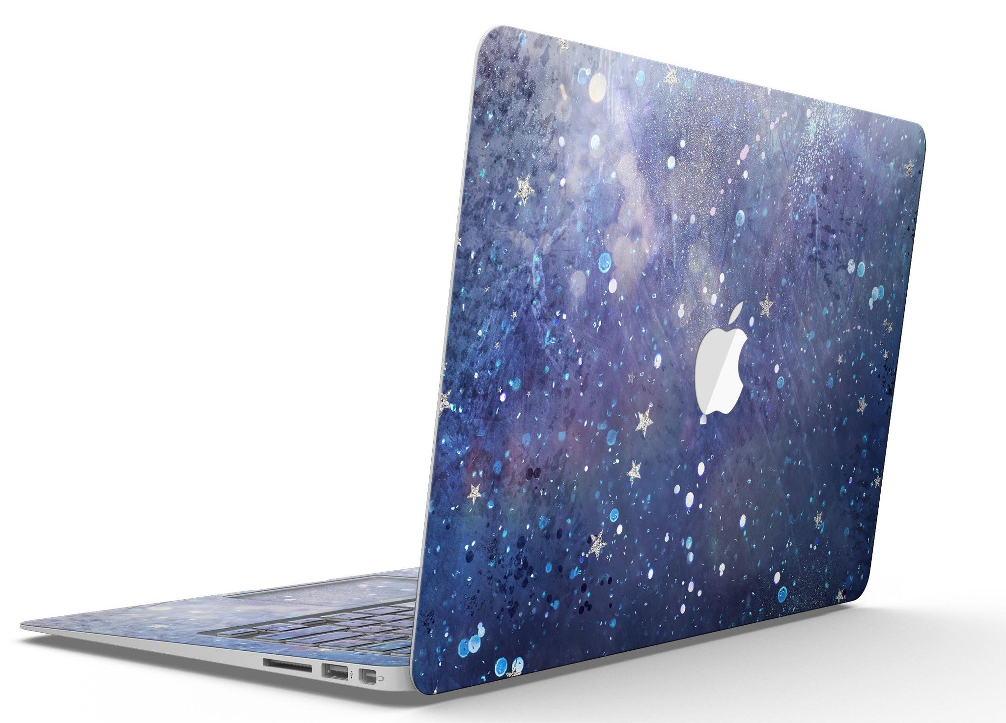 Abstract Blue Grungy Stars MacBook Air Skin Kit showcasing a vibrant design on a sleek laptop surface.