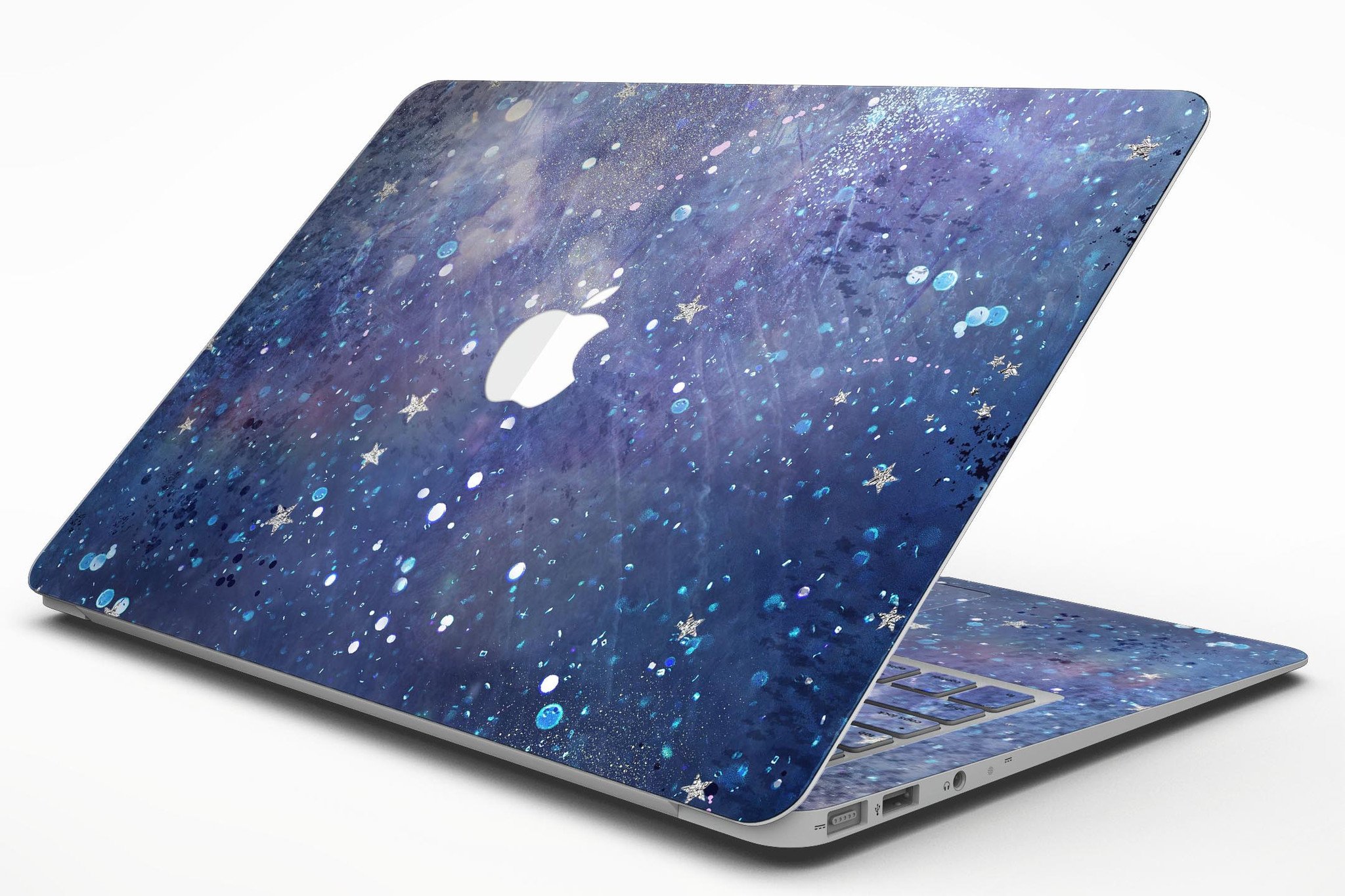 Abstract Blue Grungy Stars MacBook Air Skin Kit showcasing a vibrant design on a sleek laptop surface.