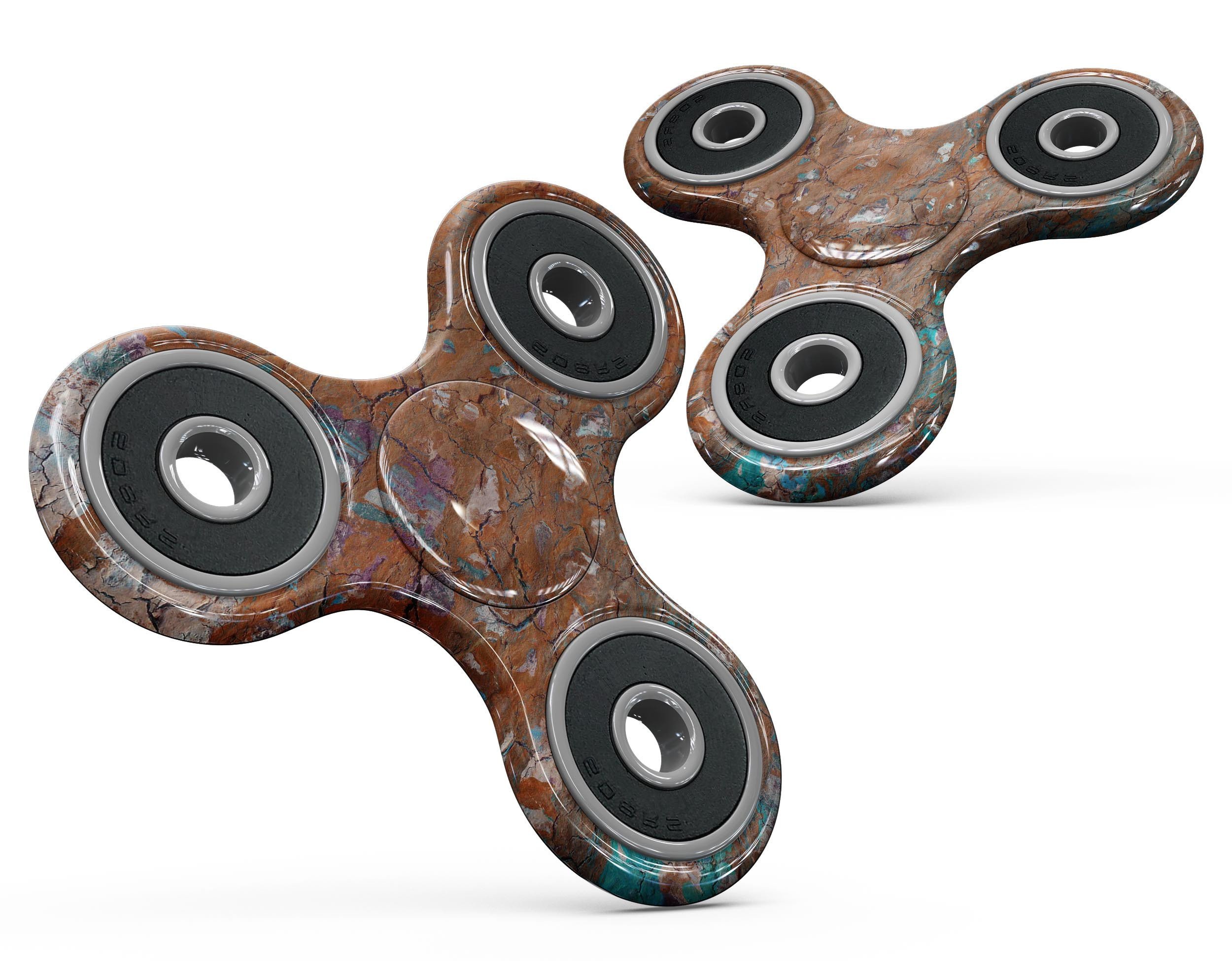 Abstract Cracked Burnt Paint Skin-Kit for fidget spinner, showcasing vibrant colors and unique design.