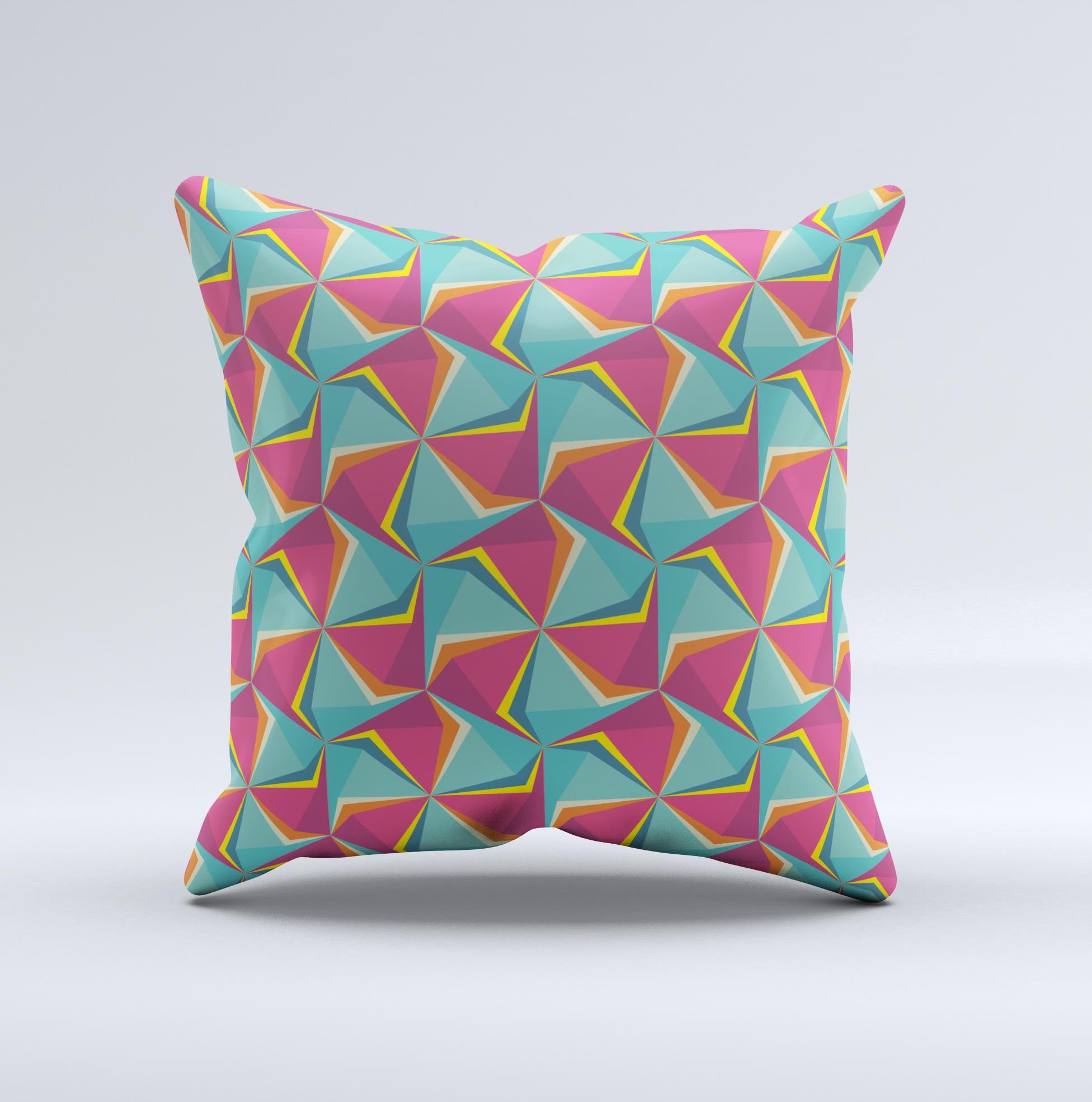 A vibrant decorative throw pillow featuring an abstract design of green and pink cubes, handcrafted in Virginia.