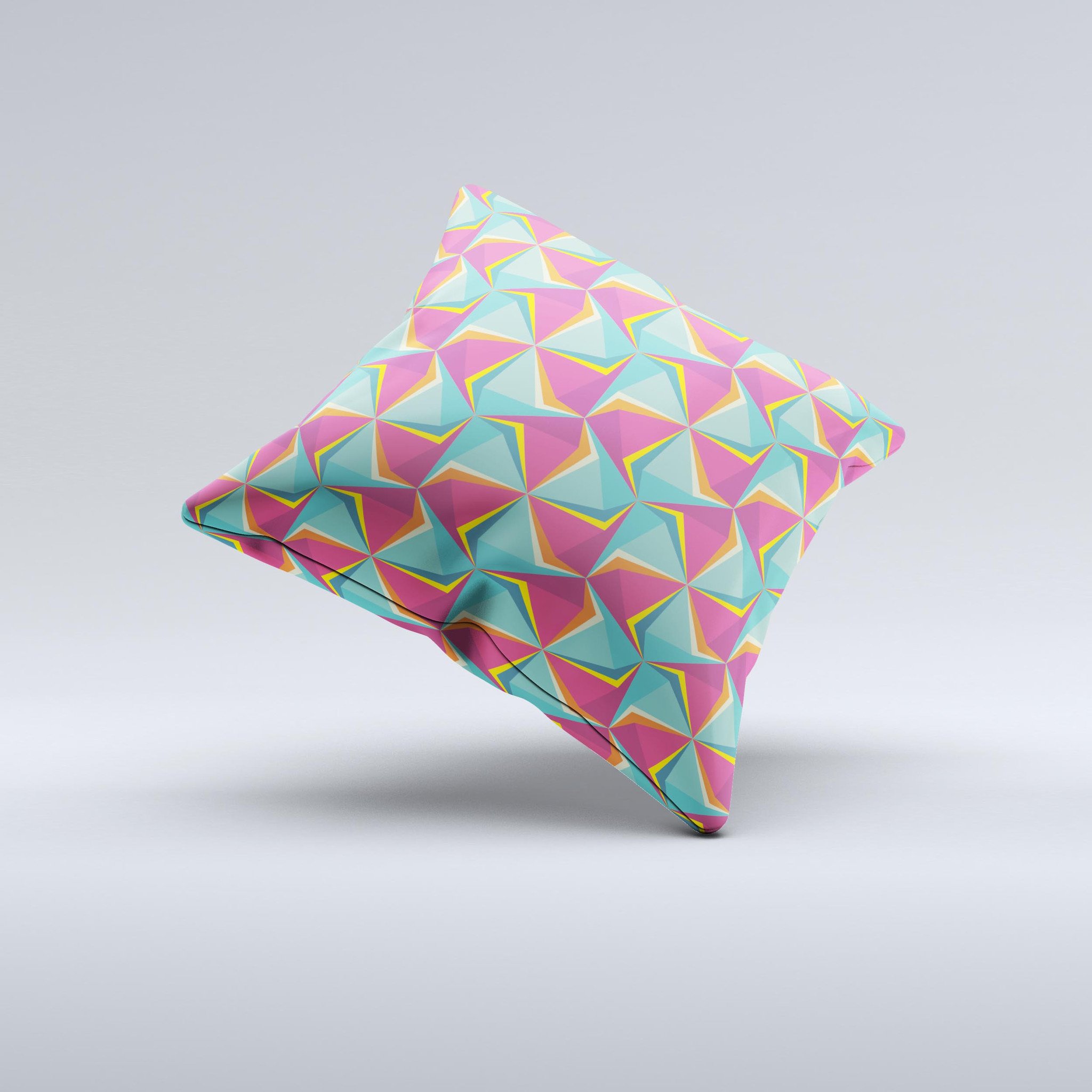 A vibrant decorative throw pillow featuring an abstract design of green and pink cubes, handcrafted in Virginia.