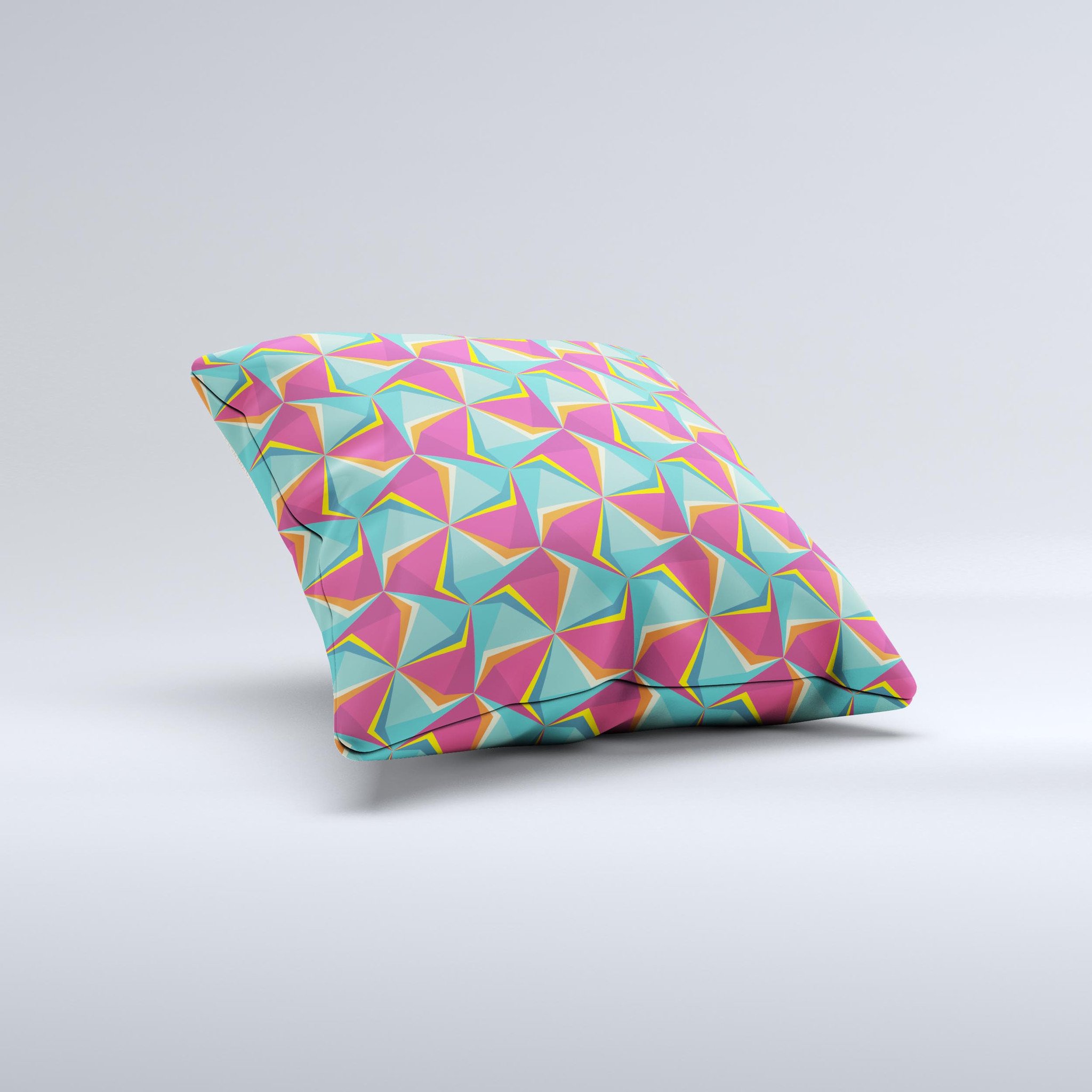 A vibrant decorative throw pillow featuring an abstract design of green and pink cubes, handcrafted in Virginia.