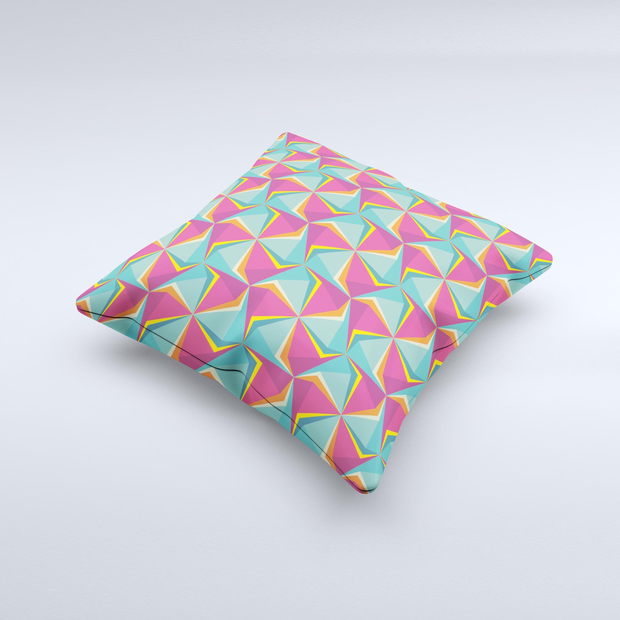 A vibrant decorative throw pillow featuring an abstract design of green and pink cubes, handcrafted in Virginia.