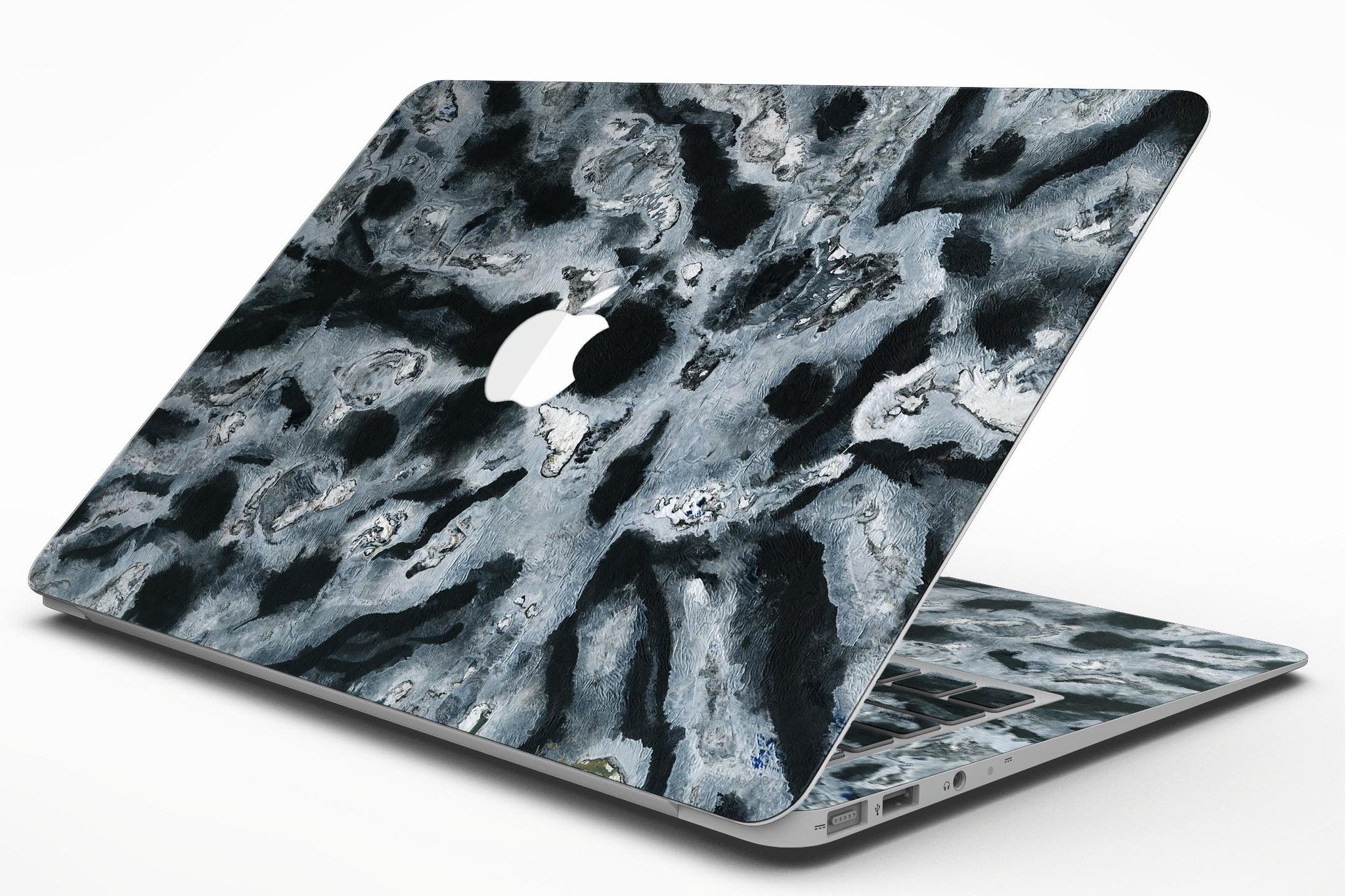 Abstract Paint v4 skin kit for MacBook Air, showcasing vibrant colors and unique design on a sleek device.