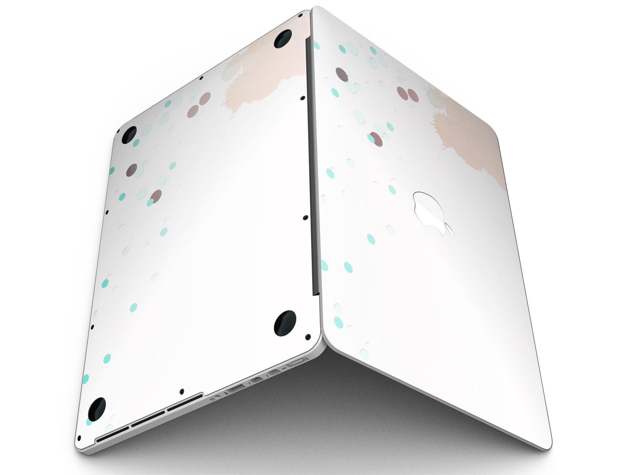 Stylish MacBook Pro skin featuring abstract teal dots and paint spill design, showcasing vibrant colors and a sleek finish.