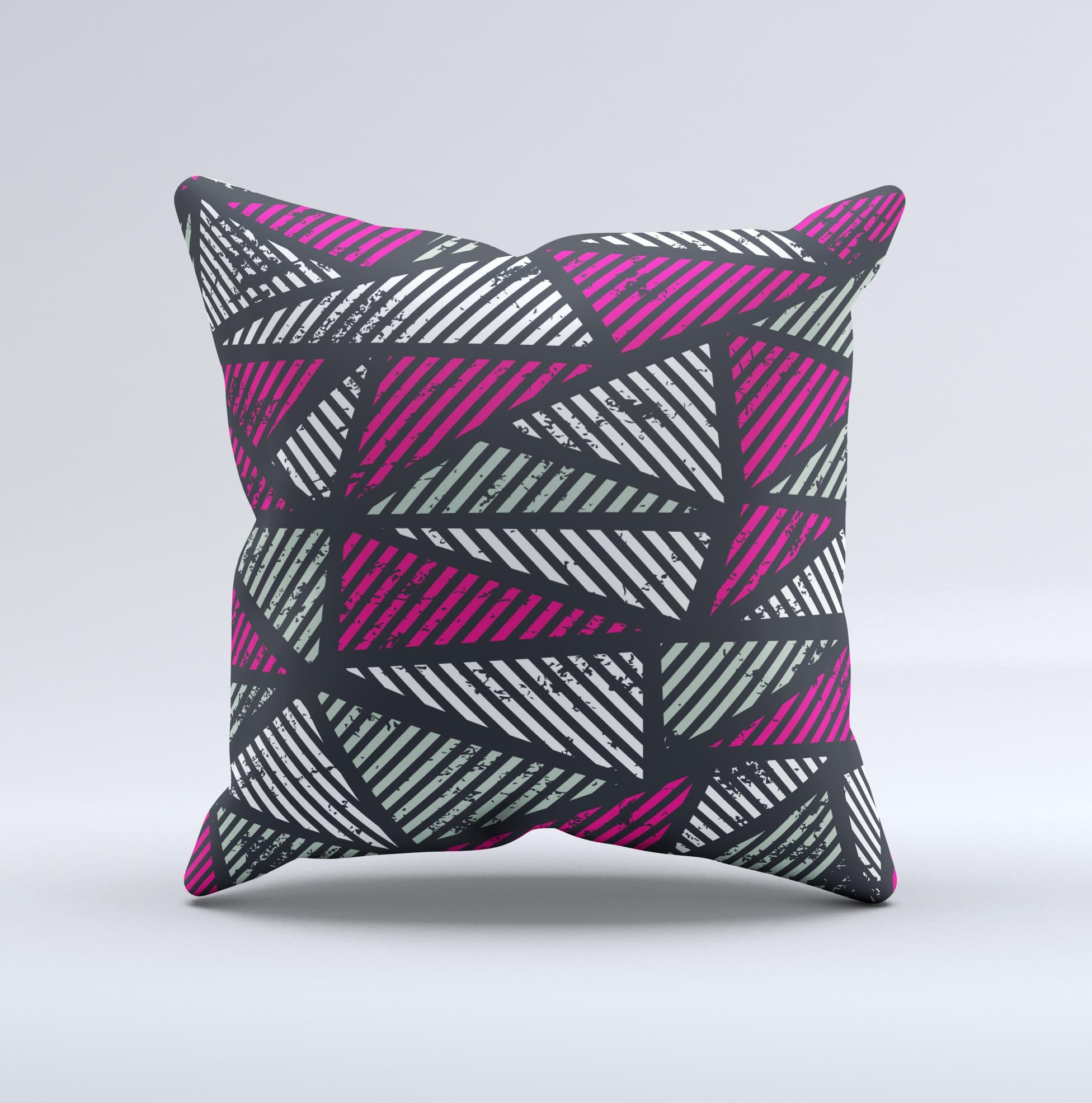 A vibrant decorative throw pillow featuring abstract striped triangles, handcrafted in Virginia with a unique ink-fuzed design.