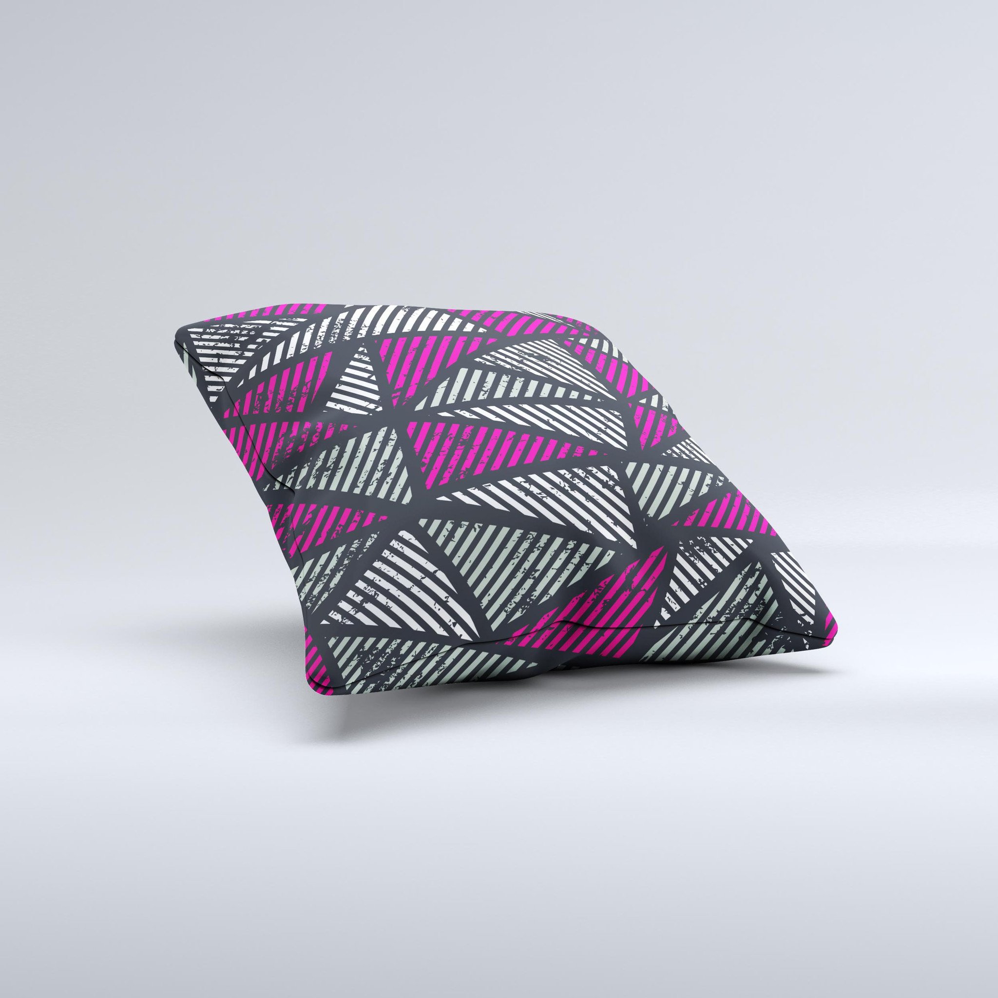 A vibrant decorative throw pillow featuring abstract striped triangles, handcrafted in Virginia with a unique ink-fuzed design.