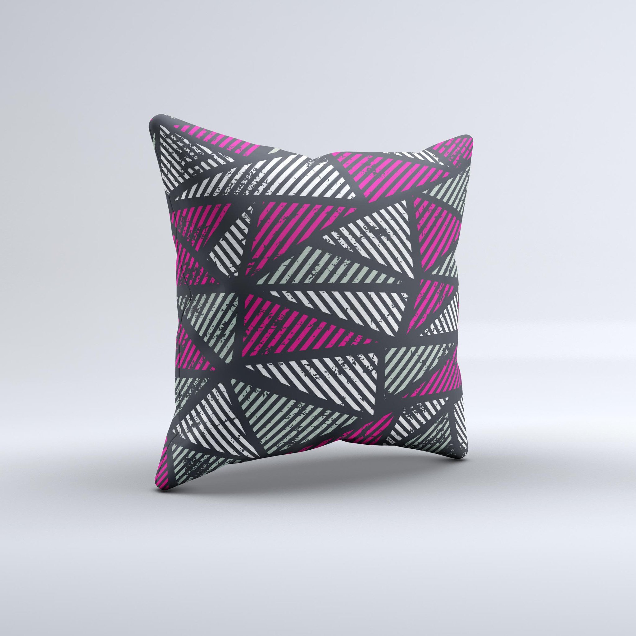 A vibrant decorative throw pillow featuring abstract striped triangles, handcrafted in Virginia with a unique ink-fuzed design.