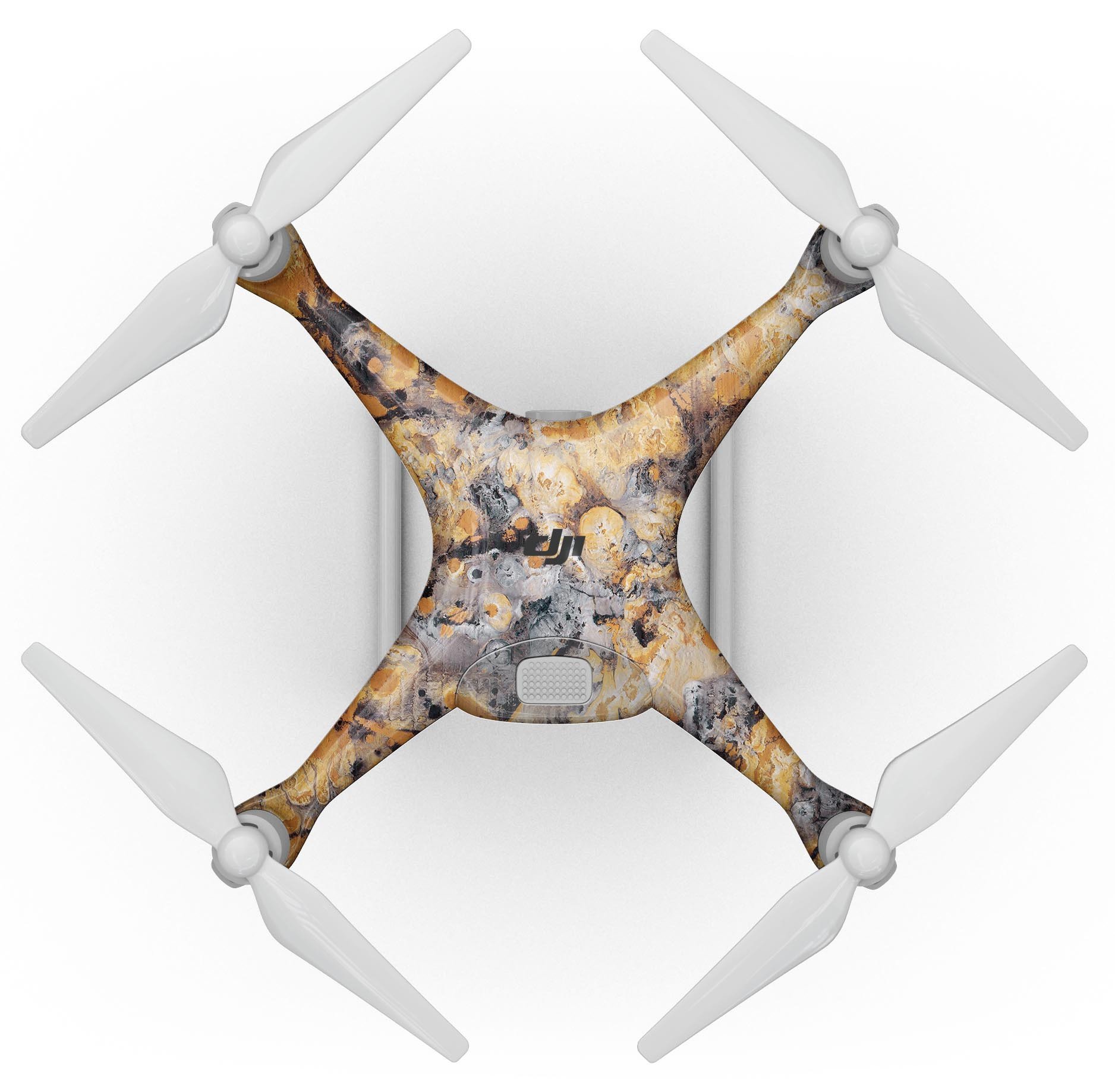 Abstract Wet Gold Paint Full-Body Skin Kit for DJI Phantom 4, showcasing a sleek design and vibrant finish.