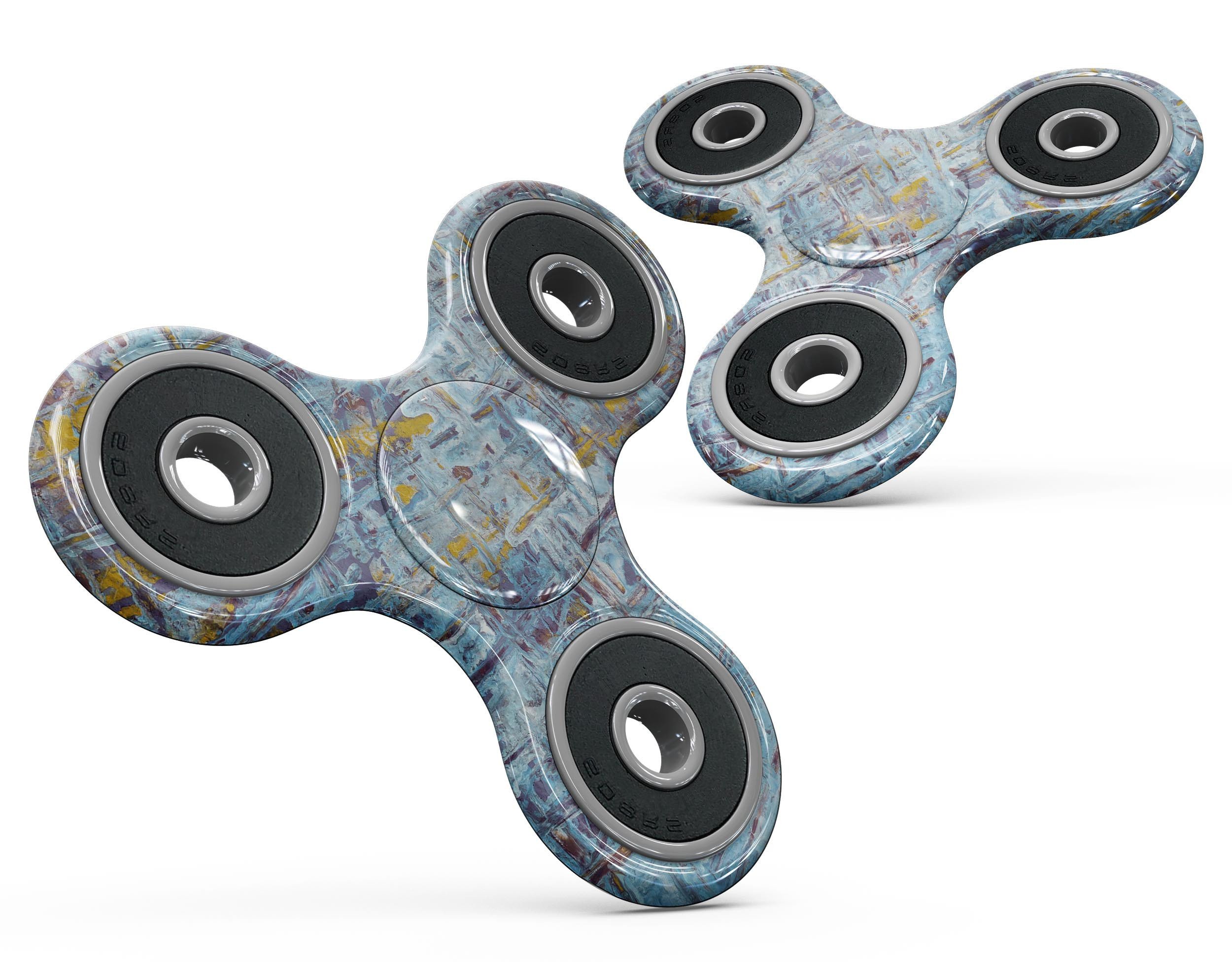 Abstract Wet Paint Blue Crossed Full-Body Skin-Kit for fidget spinner, showcasing vibrant colors and unique design.