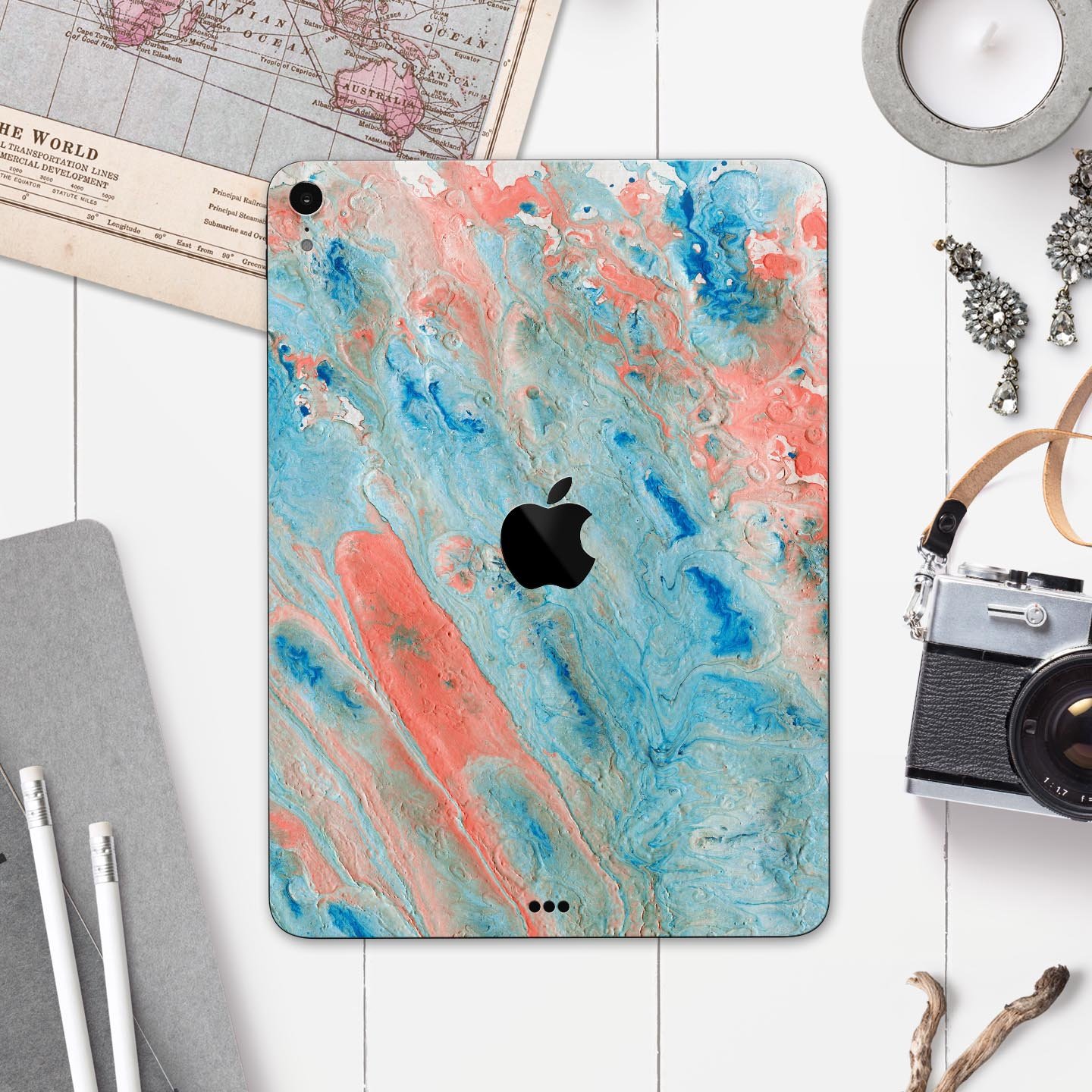 Abstract Wet Paint Coral Blues full body skin decal for Apple devices, showcasing vibrant colors and a sleek design.