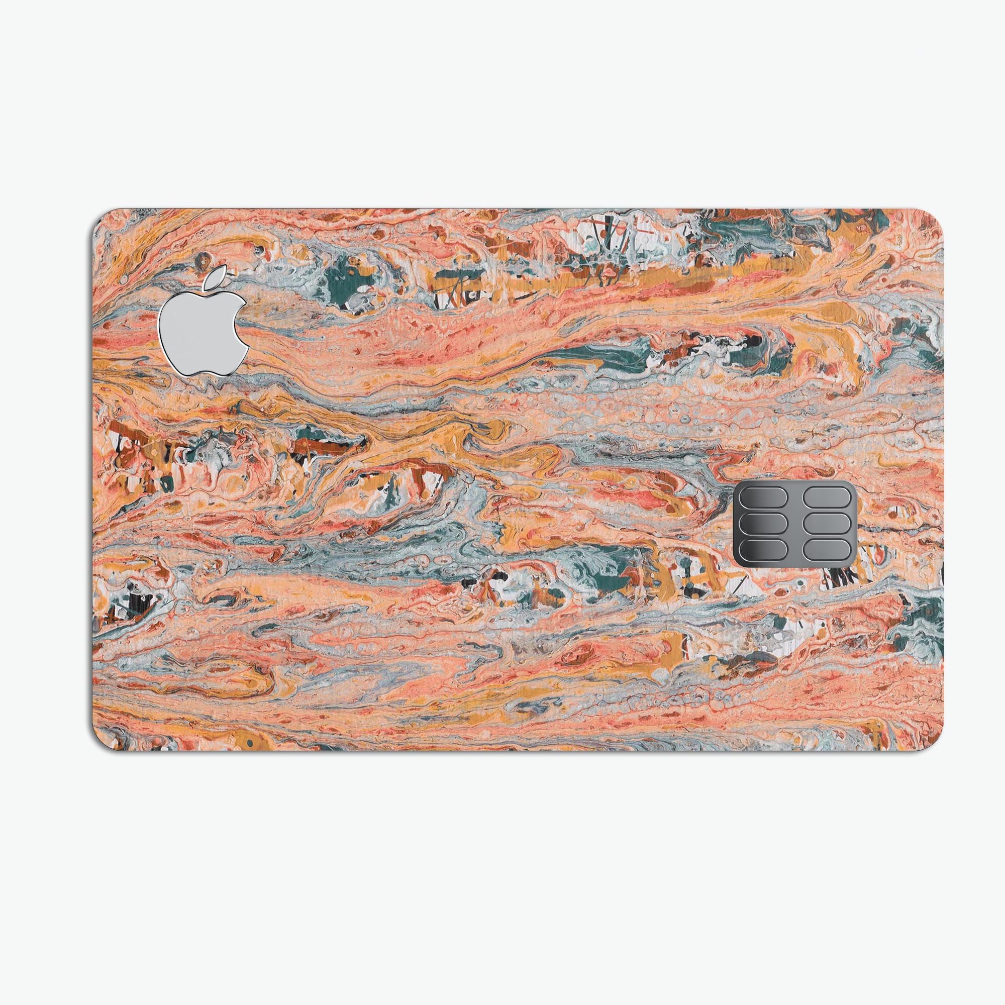 Abstract Wet Paint Coral Love decal skin for Apple Card, showcasing vibrant colors and a stylish design.