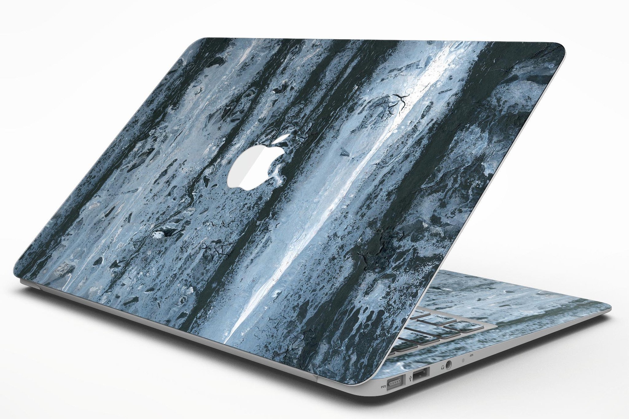 Abstract Wet Paint Soft Blue skin kit for MacBook Air, showcasing a stylish design with soft blue tones and an abstract pattern.