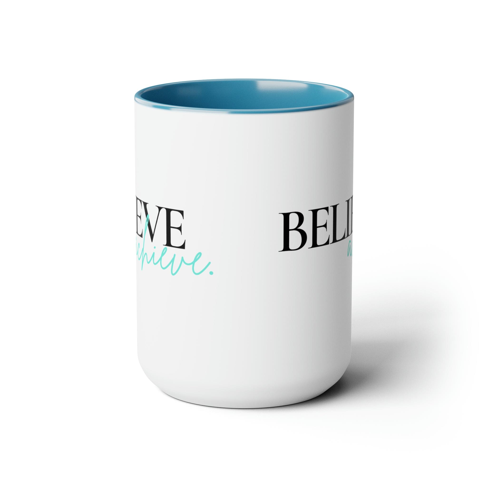 Black ceramic coffee mug with colored interior and handle, featuring the inspirational phrase 'Believe and Achieve'.