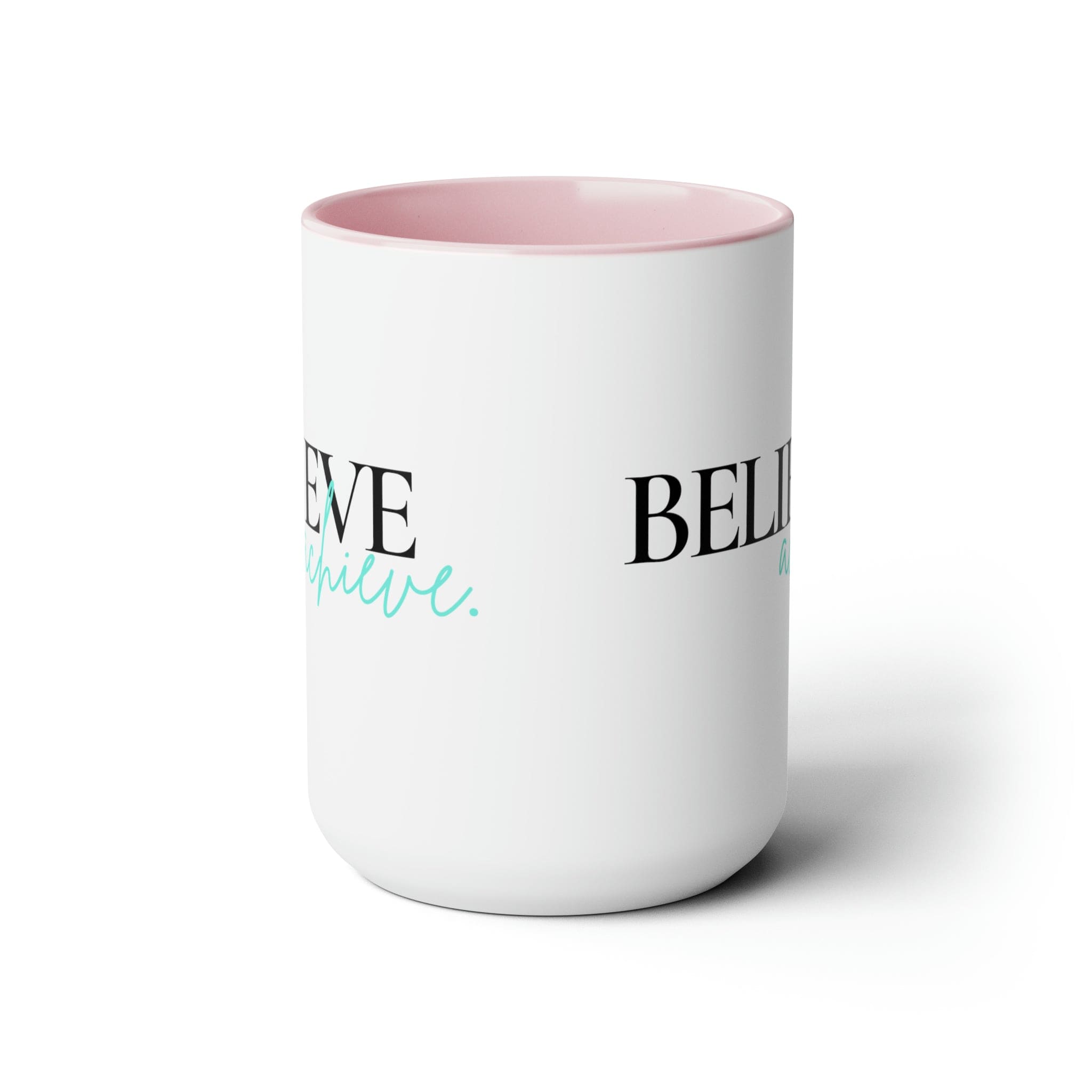 Black ceramic coffee mug with colored interior and handle, featuring the inspirational phrase 'Believe and Achieve'.