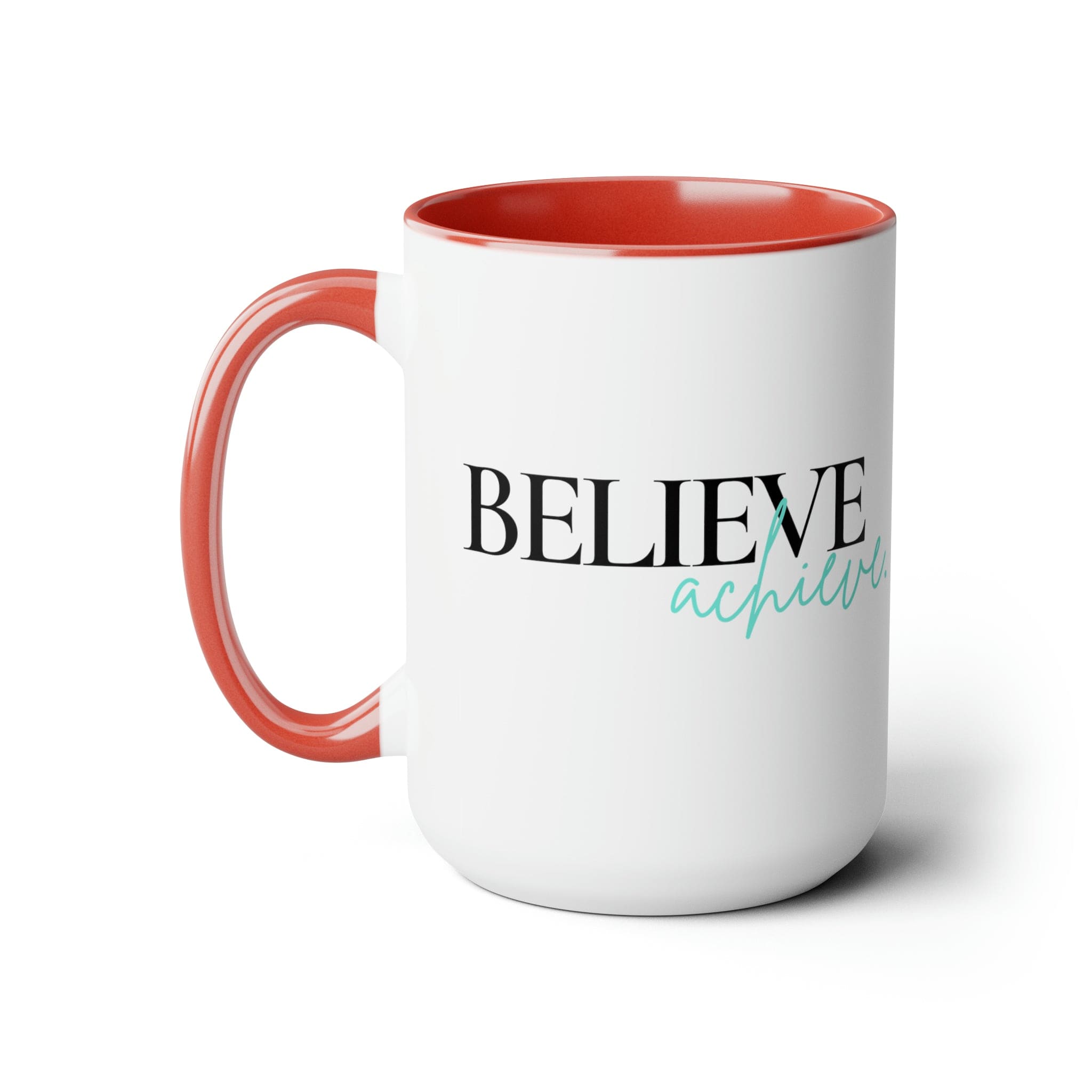 Black ceramic coffee mug with colored interior and handle, featuring the inspirational phrase 'Believe and Achieve'.