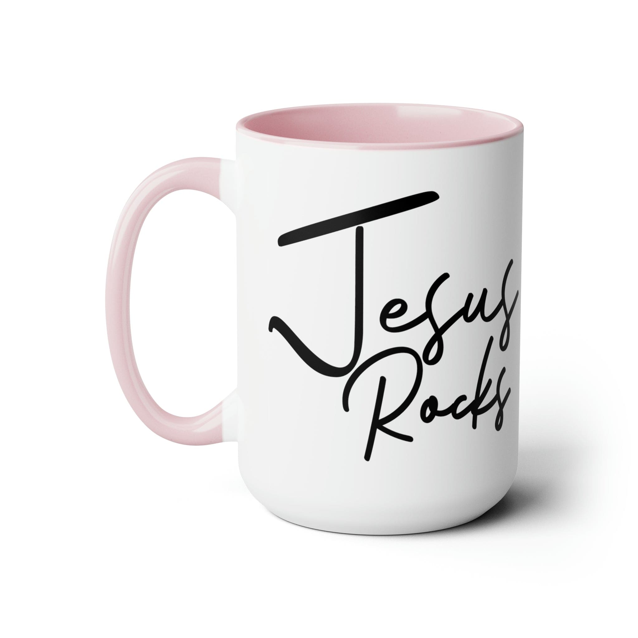 Black ceramic coffee mug with 'Jesus Rocks' text, featuring a colored interior and handle, perfect for hot and cold beverages.