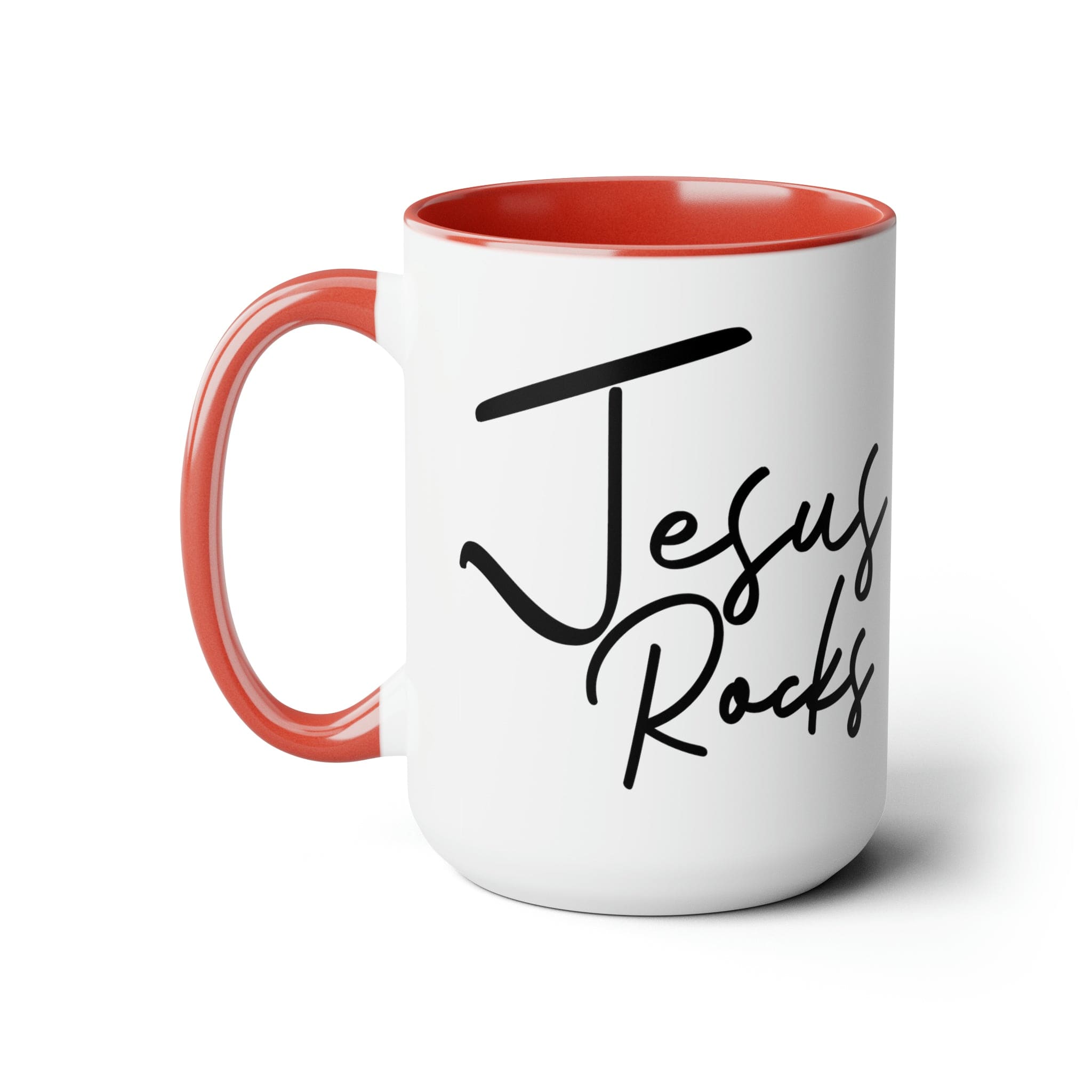 Black ceramic coffee mug with 'Jesus Rocks' text, featuring a colored interior and handle, perfect for hot and cold beverages.