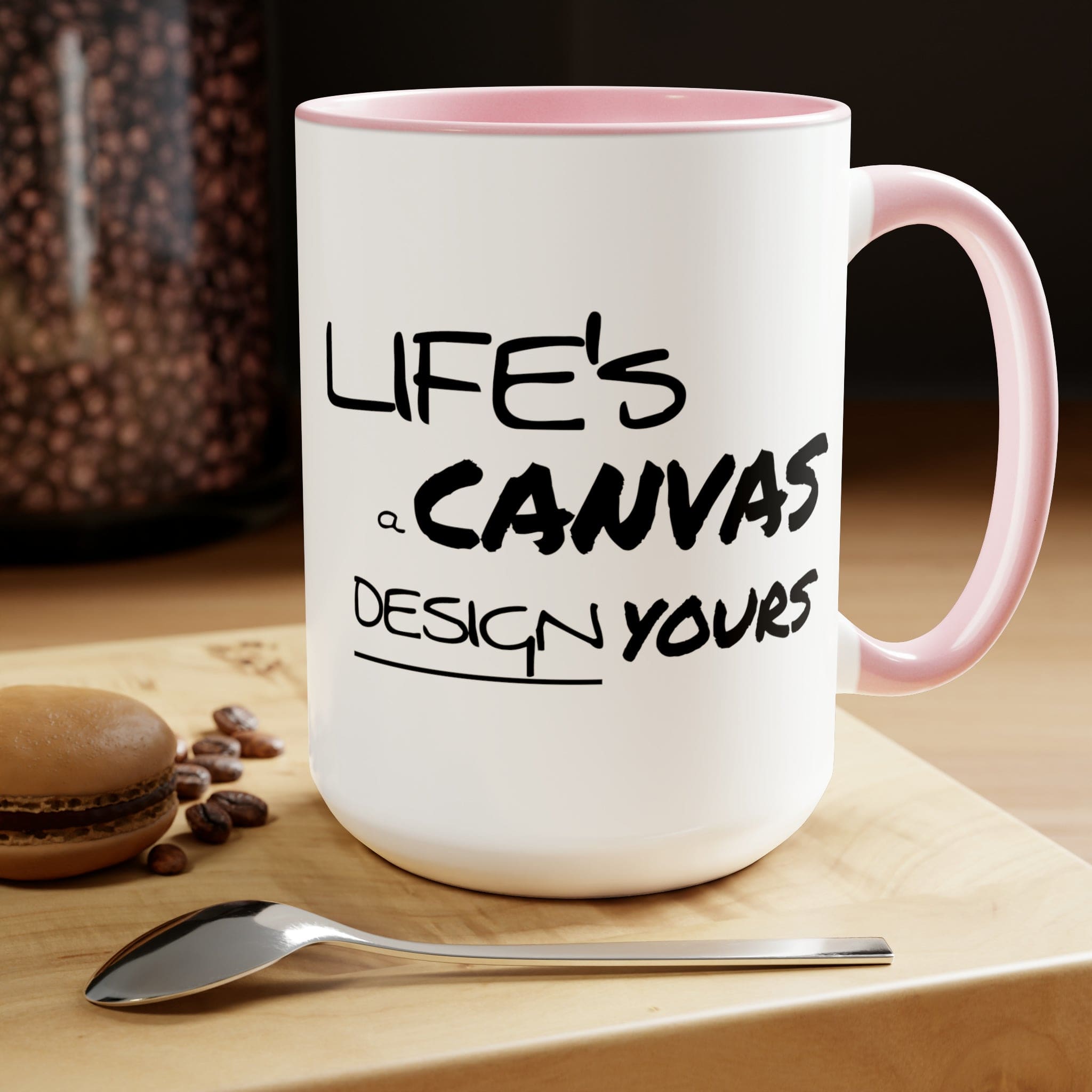 Black ceramic coffee mug with a motivational design, featuring a colored interior and handle, perfect for hot and cold beverages.