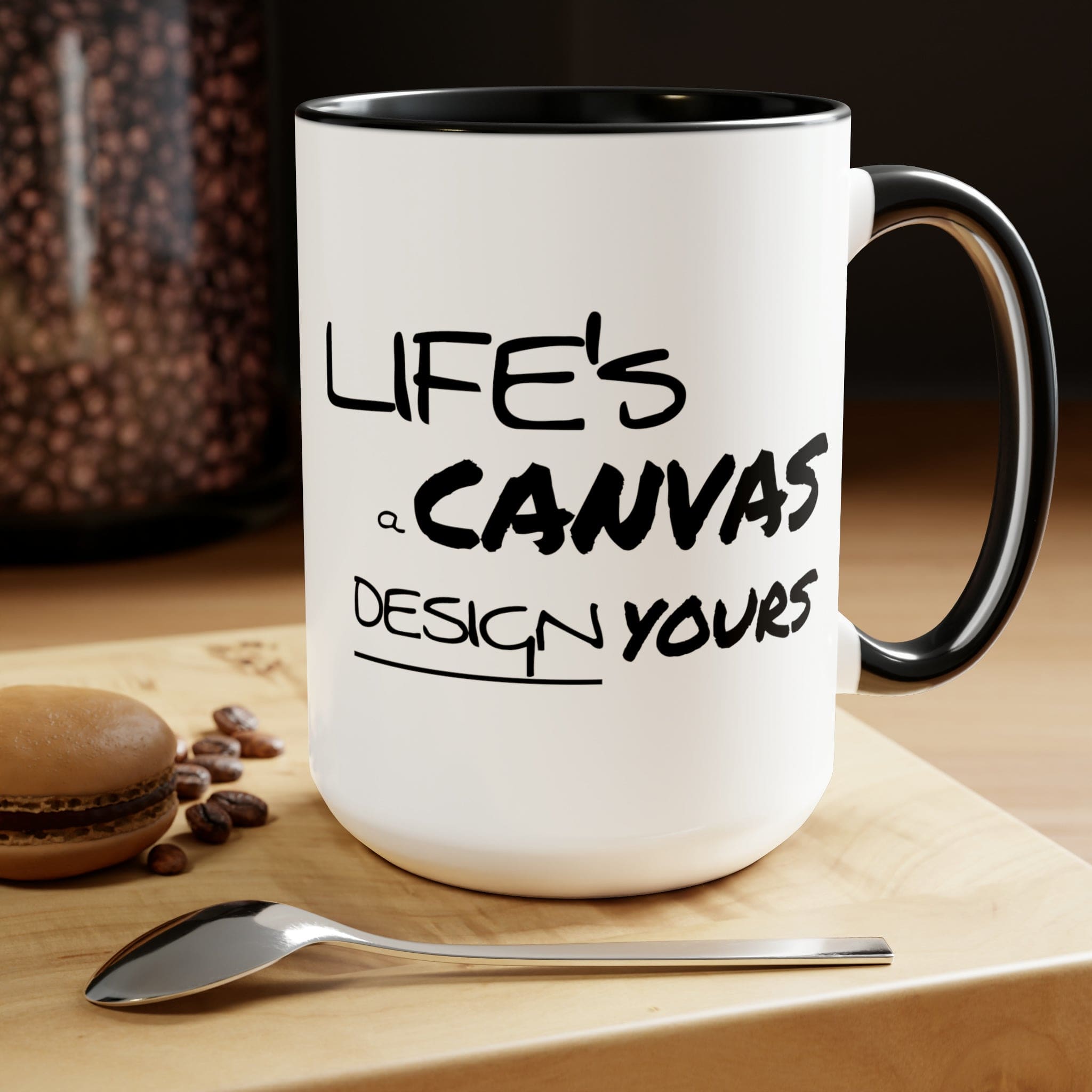 Black ceramic coffee mug with a motivational design, featuring a colored interior and handle, perfect for hot and cold beverages.