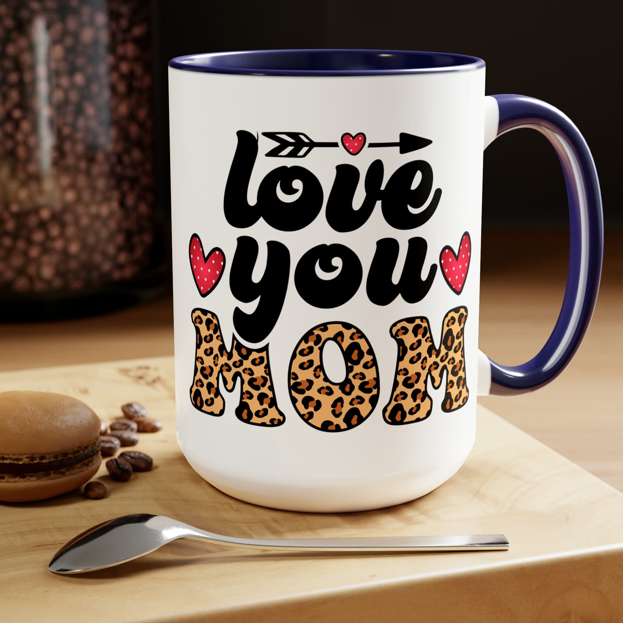 Accent Ceramic Coffee Mug featuring a Love You Mom leopard print design with a black exterior and colored interior, perfect for hot and cold beverages.