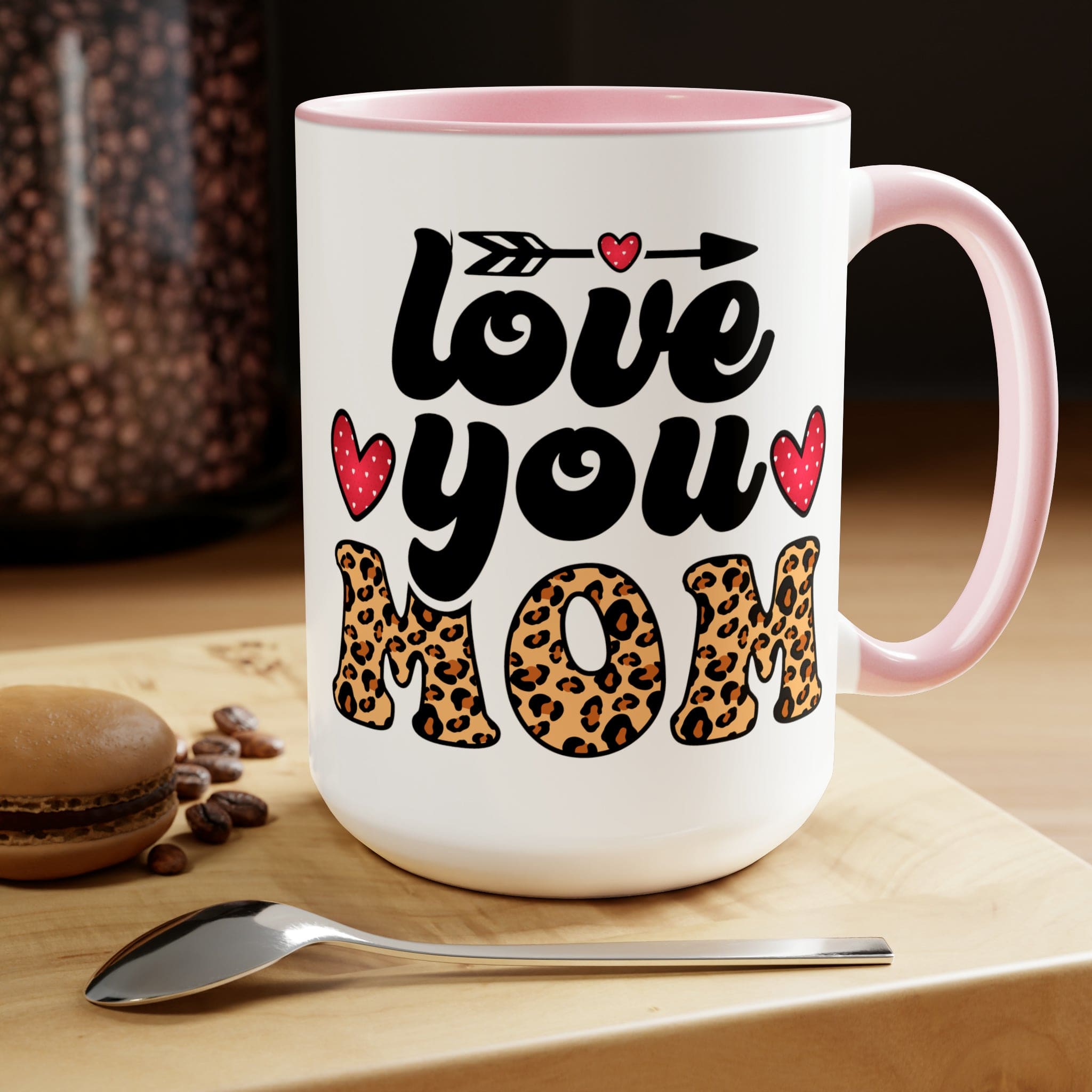 Accent Ceramic Coffee Mug featuring a Love You Mom leopard print design with a black exterior and colored interior, perfect for hot and cold beverages.