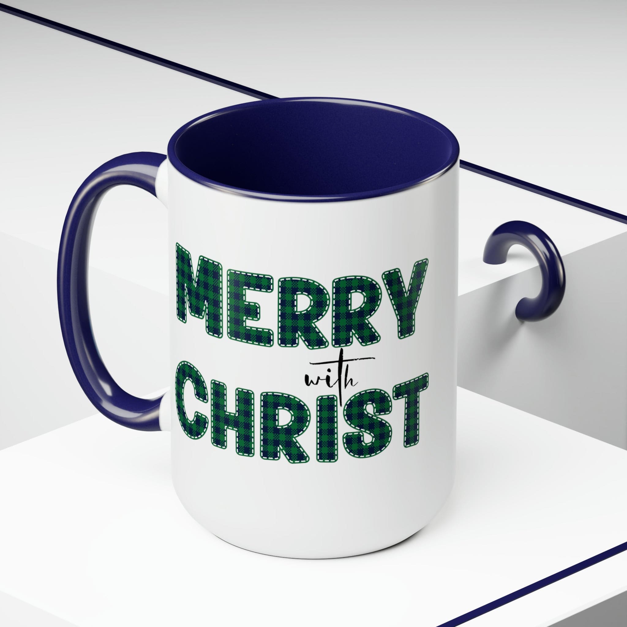 Accent Ceramic Coffee Mug 15oz featuring a Merry with Christ design in a green plaid pattern, perfect for holiday beverages.