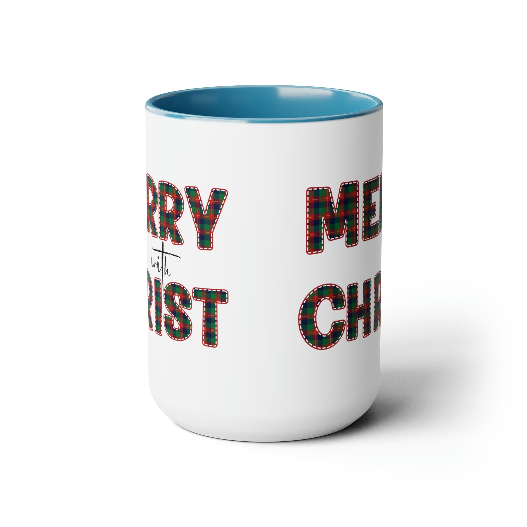 Accent Ceramic Coffee Mug 15oz featuring a Merry with Christ design in red and green plaid, perfect for holiday beverages.