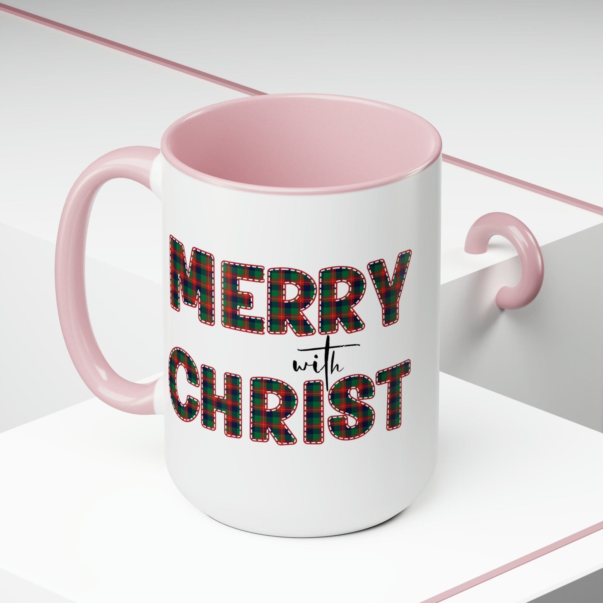 Accent Ceramic Coffee Mug 15oz featuring a Merry with Christ design in red and green plaid, perfect for holiday beverages.