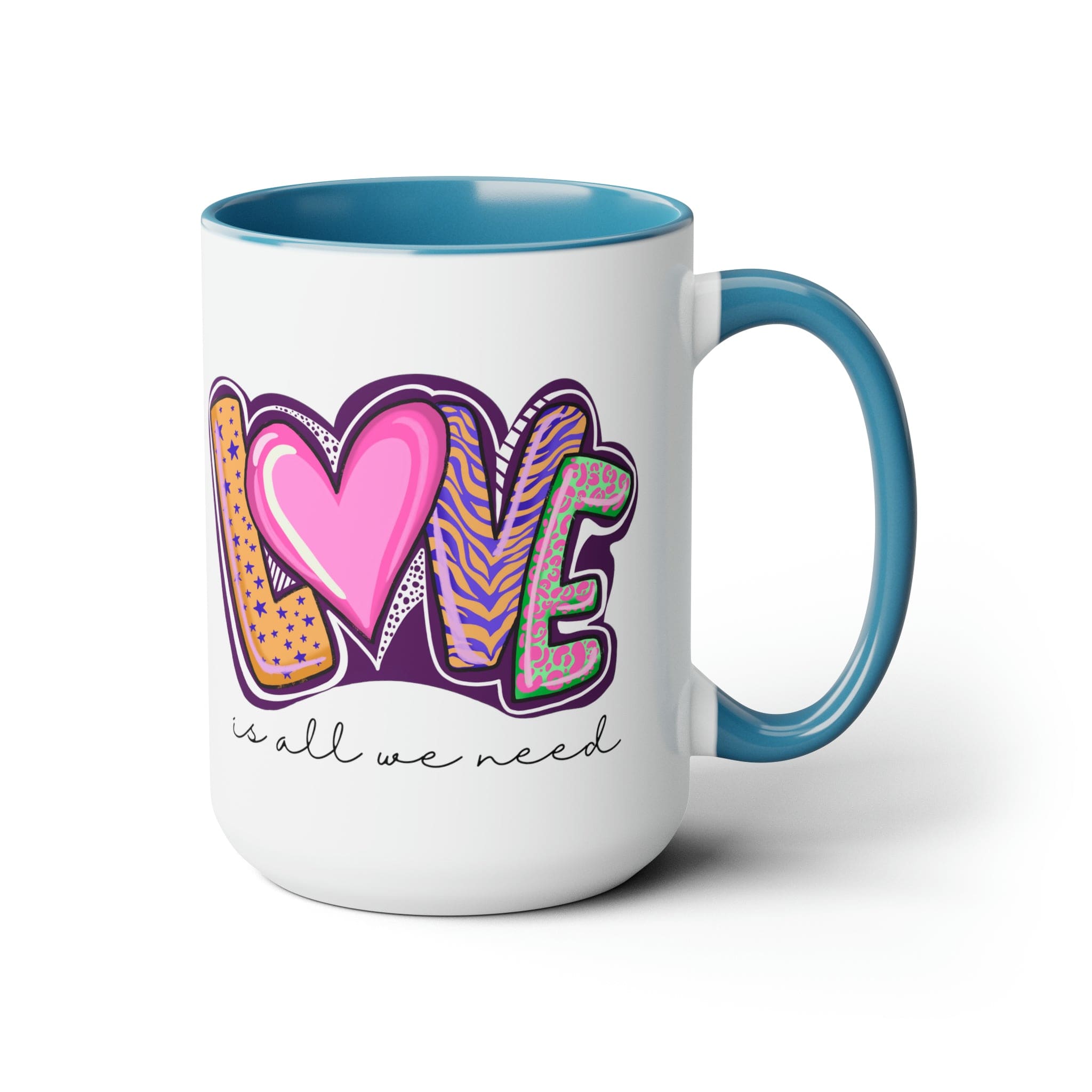 Accent Ceramic Coffee Mug 15oz with a white exterior and colorful interior, featuring the phrase 'Love is All we Need' on the side.