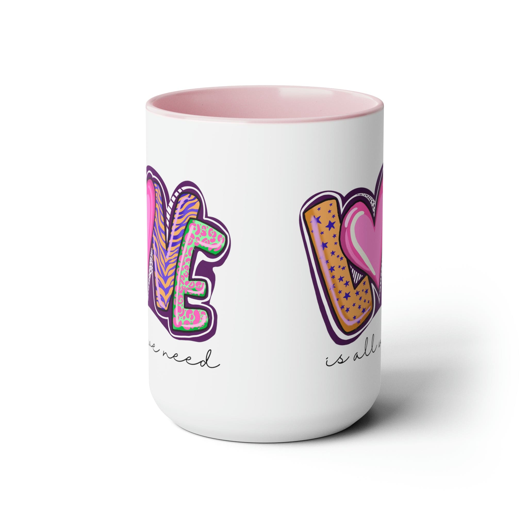 Accent Ceramic Coffee Mug 15oz with a white exterior and colorful interior, featuring the phrase 'Love is All we Need' on the side.