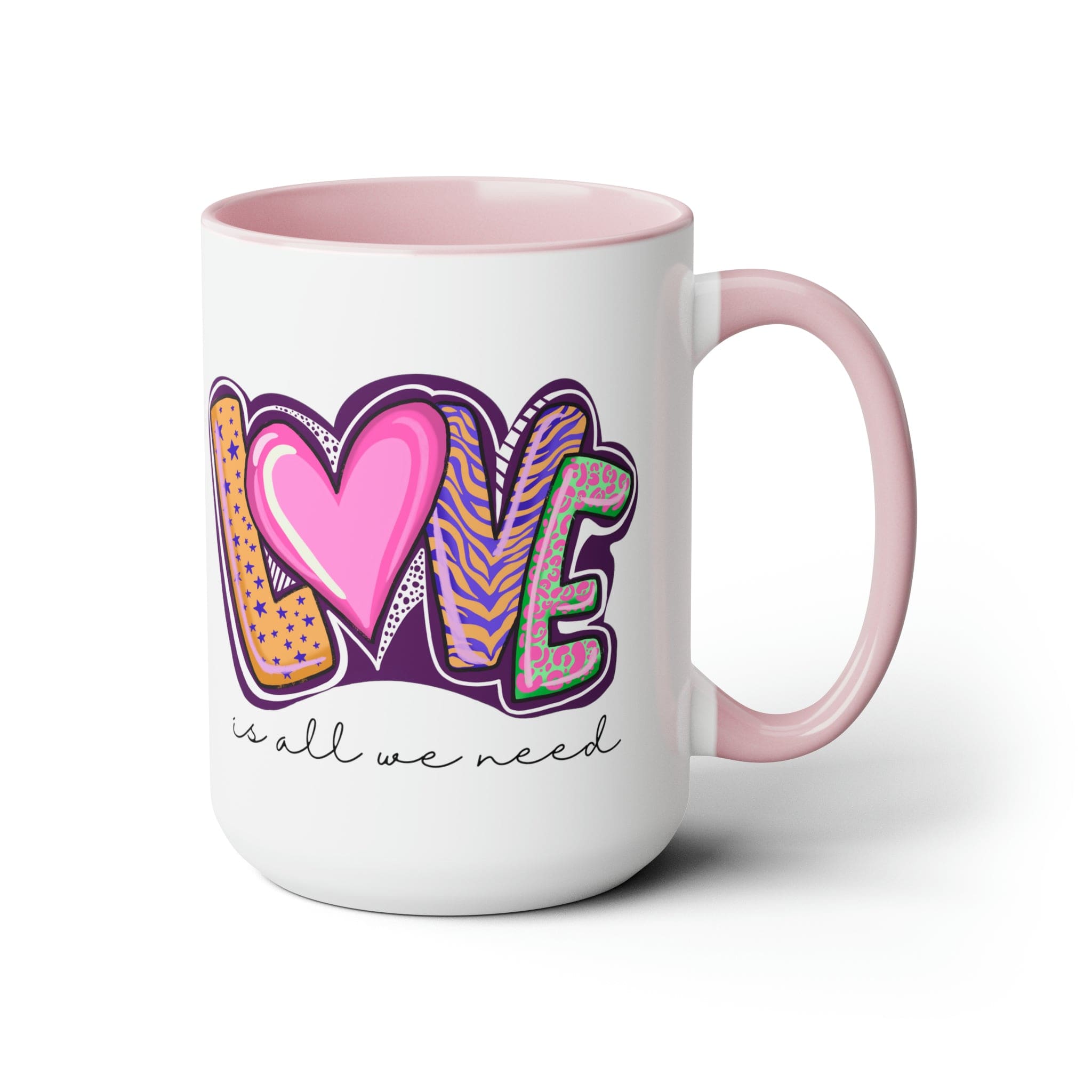 Accent Ceramic Coffee Mug 15oz with a white exterior and colorful interior, featuring the phrase 'Love is All we Need' on the side.