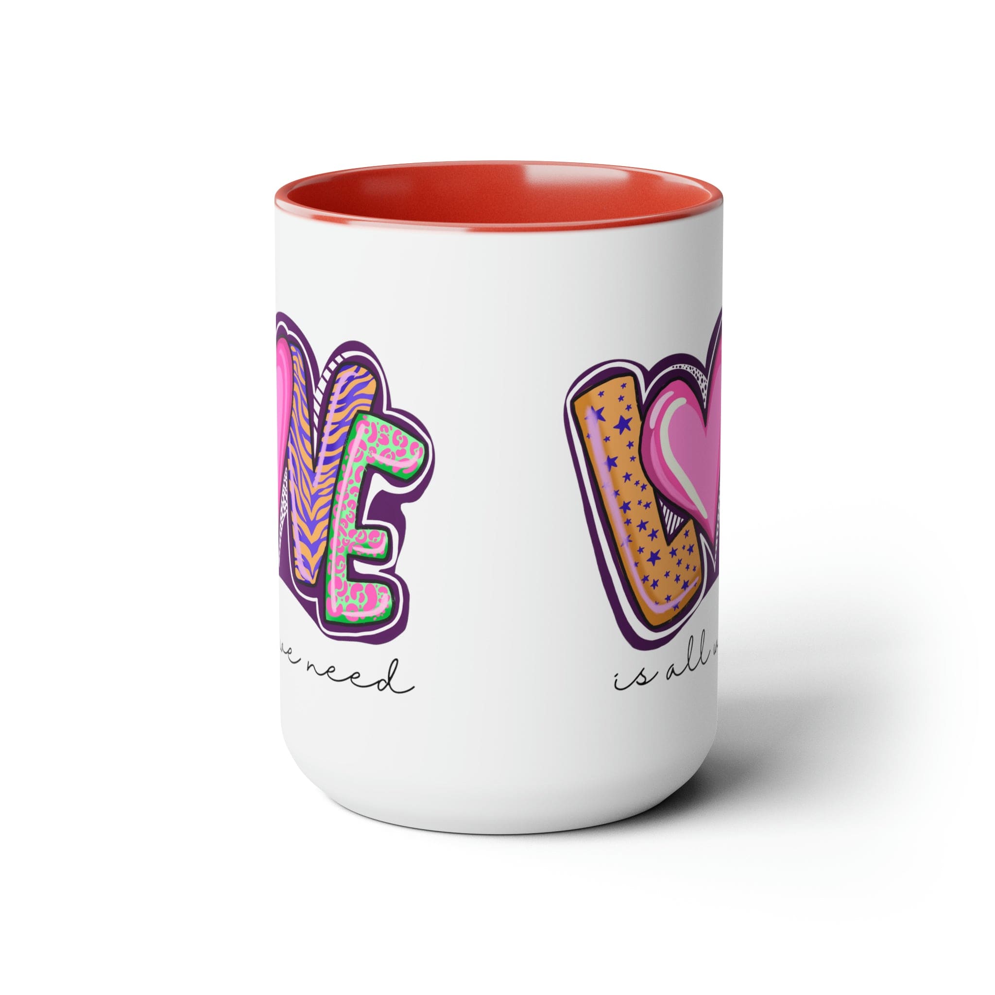 Accent Ceramic Coffee Mug 15oz with a white exterior and colorful interior, featuring the phrase 'Love is All we Need' on the side.