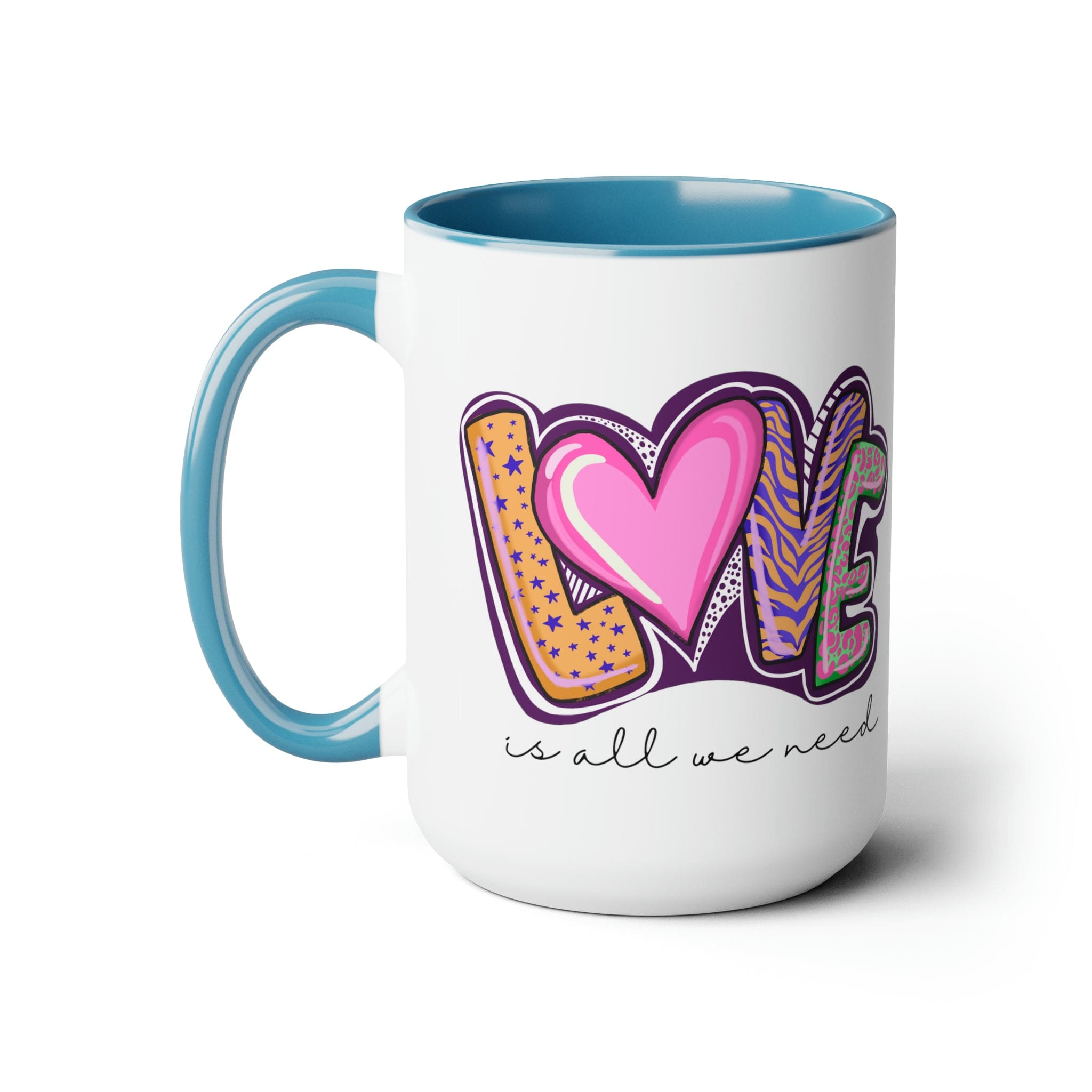 Accent Ceramic Coffee Mug 15oz with a white exterior and colorful interior, featuring the phrase 'Love is All we Need' on the side.