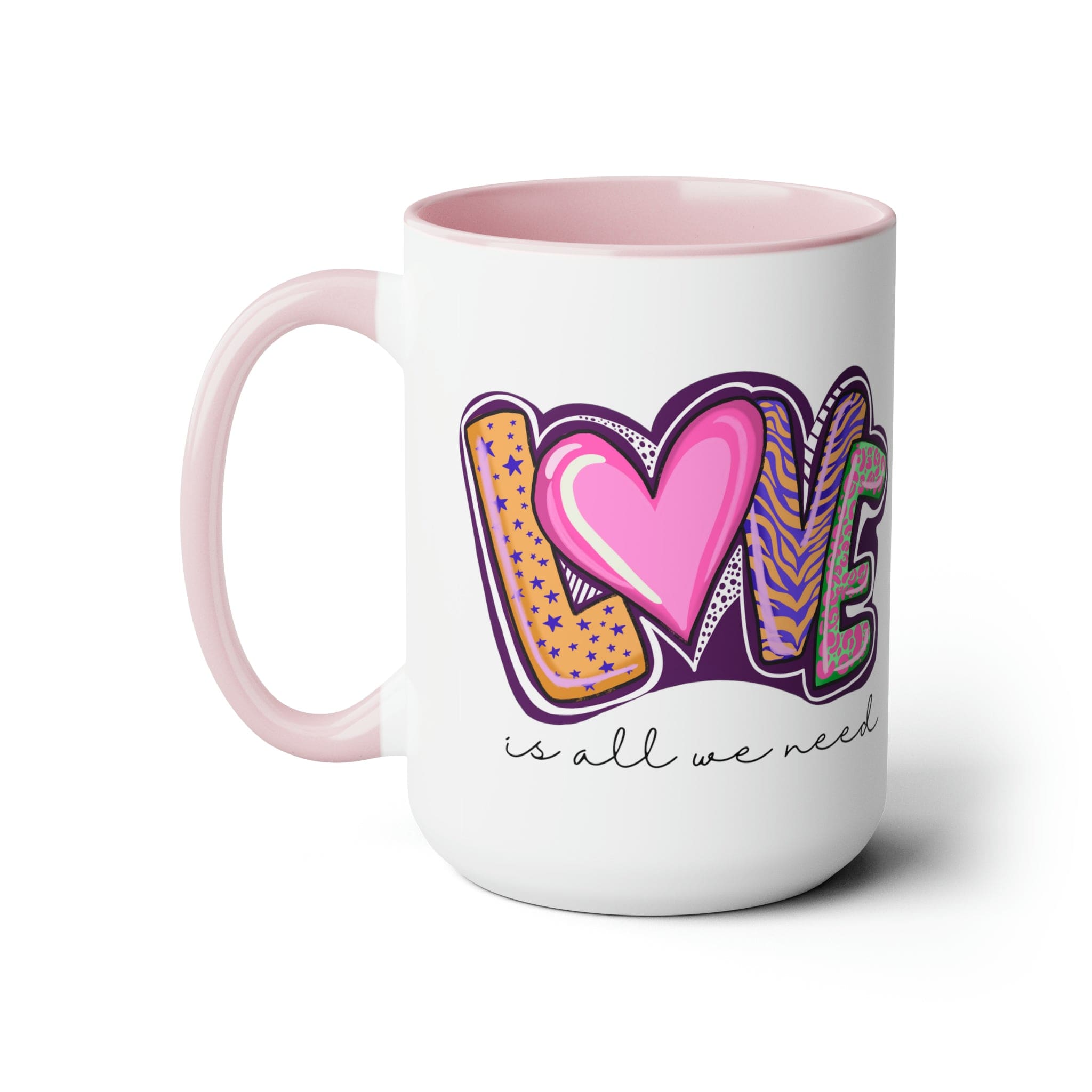 Accent Ceramic Coffee Mug 15oz with a white exterior and colorful interior, featuring the phrase 'Love is All we Need' on the side.