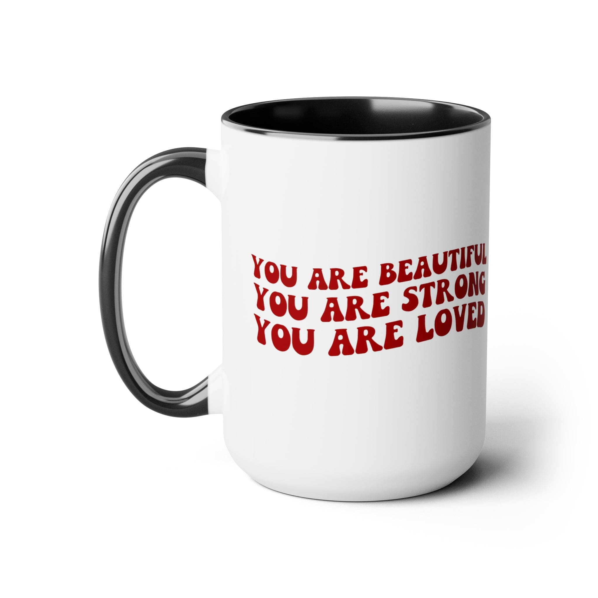 Red ceramic coffee mug with a white exterior and colored interior, featuring the inspirational message 'You Are Beautiful Strong Loved'.