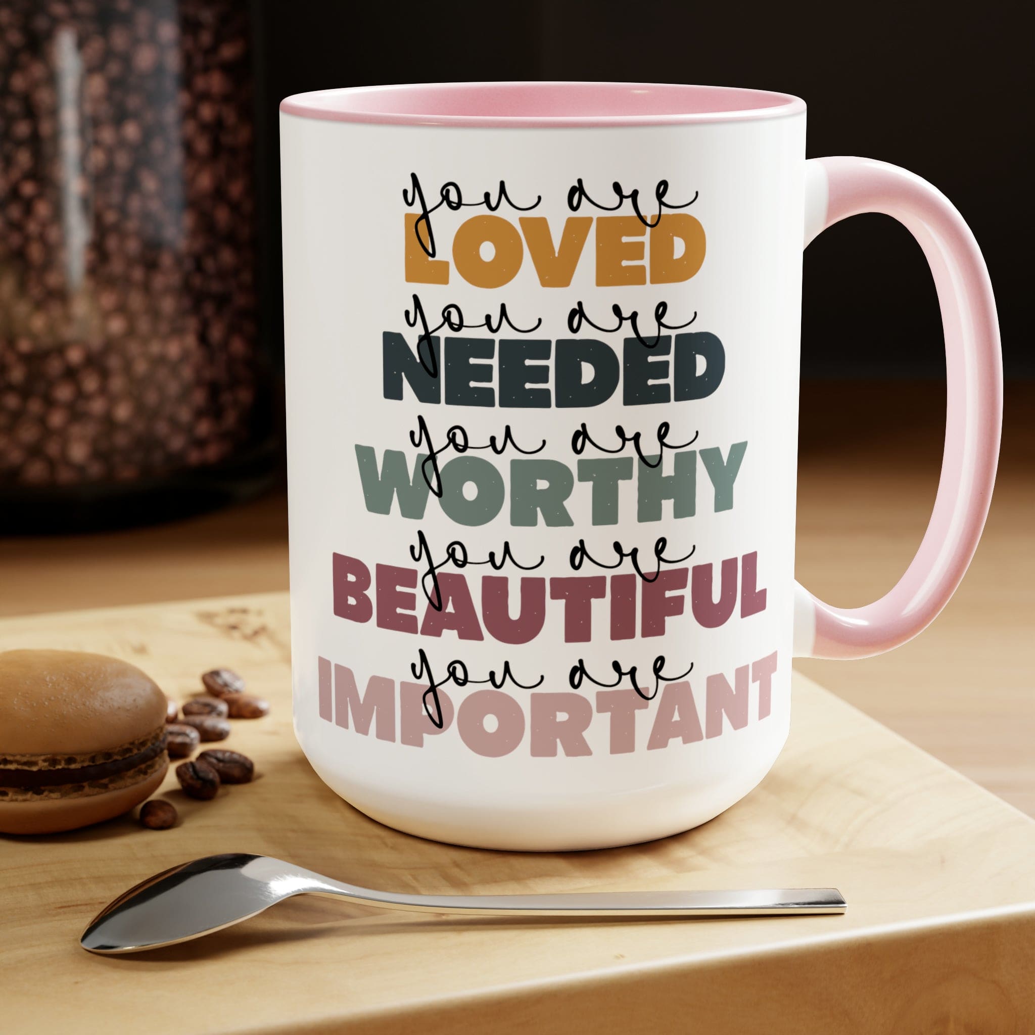 You Are Loved Ceramic Coffee Mug with a white exterior and colored interior, featuring a C-handle and inspirational message.